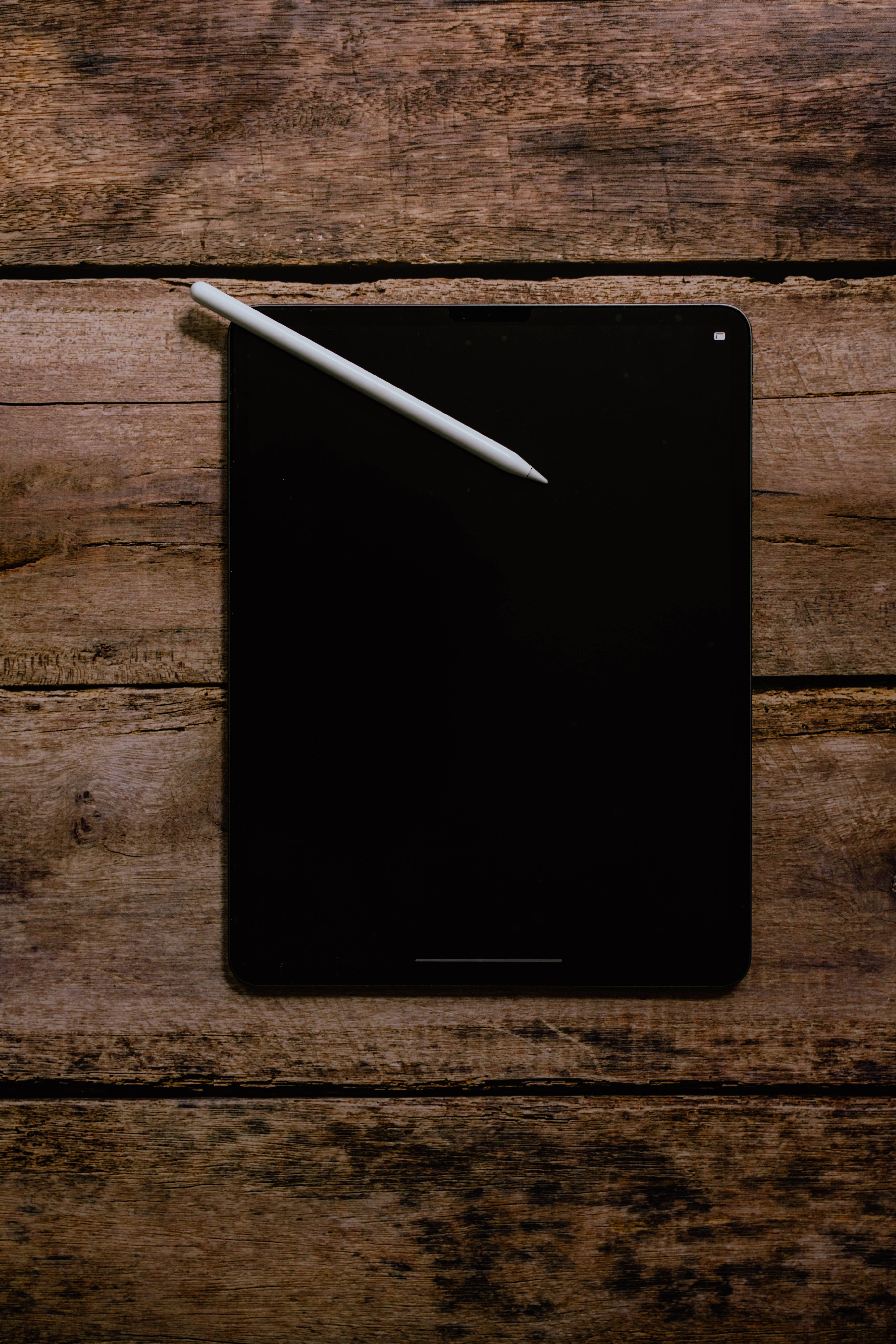 Apple iPad Pro บนไม้ วอลเปเปอร์