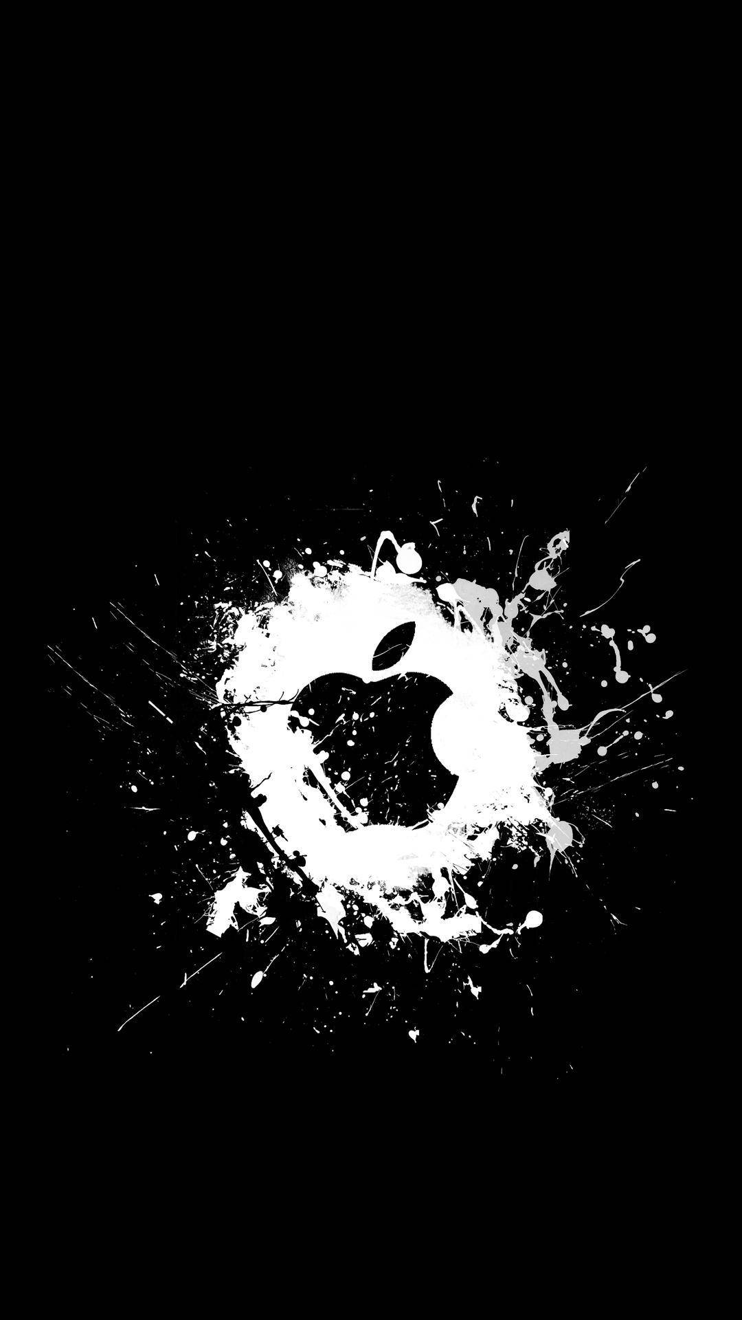 โลโก้ Apple สีดำบนพื้นหลังสีขาวกระเซ็น วอลเปเปอร์