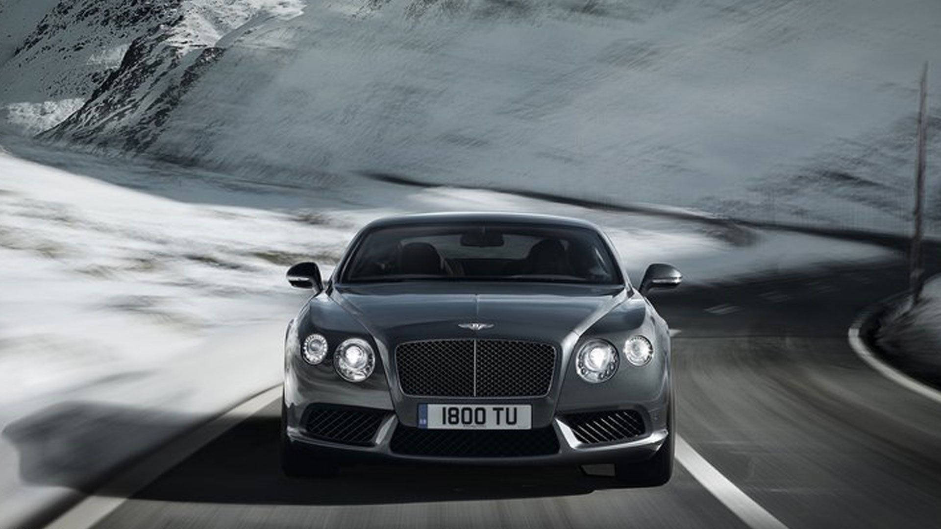 Bentley วิ่งเร็วในภูเขาที่เต็มไปด้วยหิมะ วอลเปเปอร์