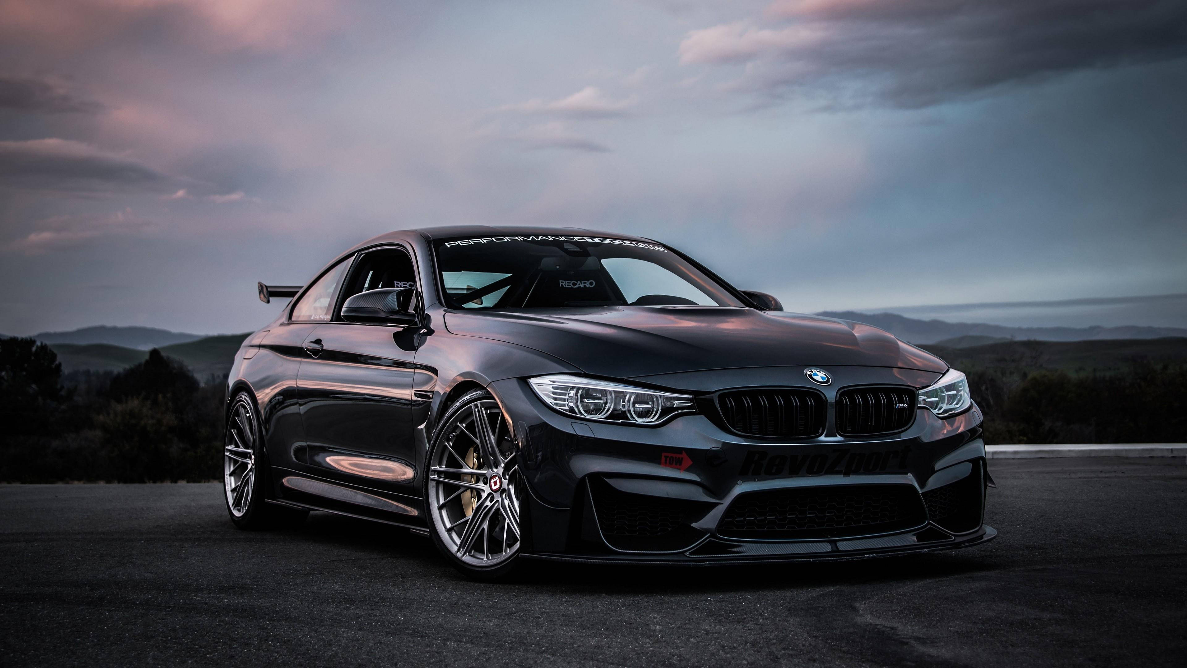 BMW M4 สีดำด้านบนแล็ปท็อป วอลเปเปอร์