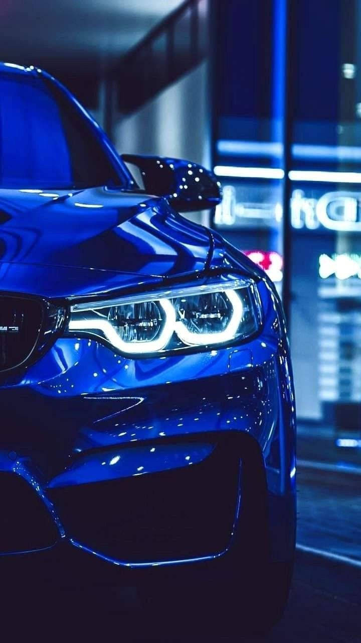 ไฟหน้าเรืองแสงของ BMW สีน้ำเงิน วอลเปเปอร์