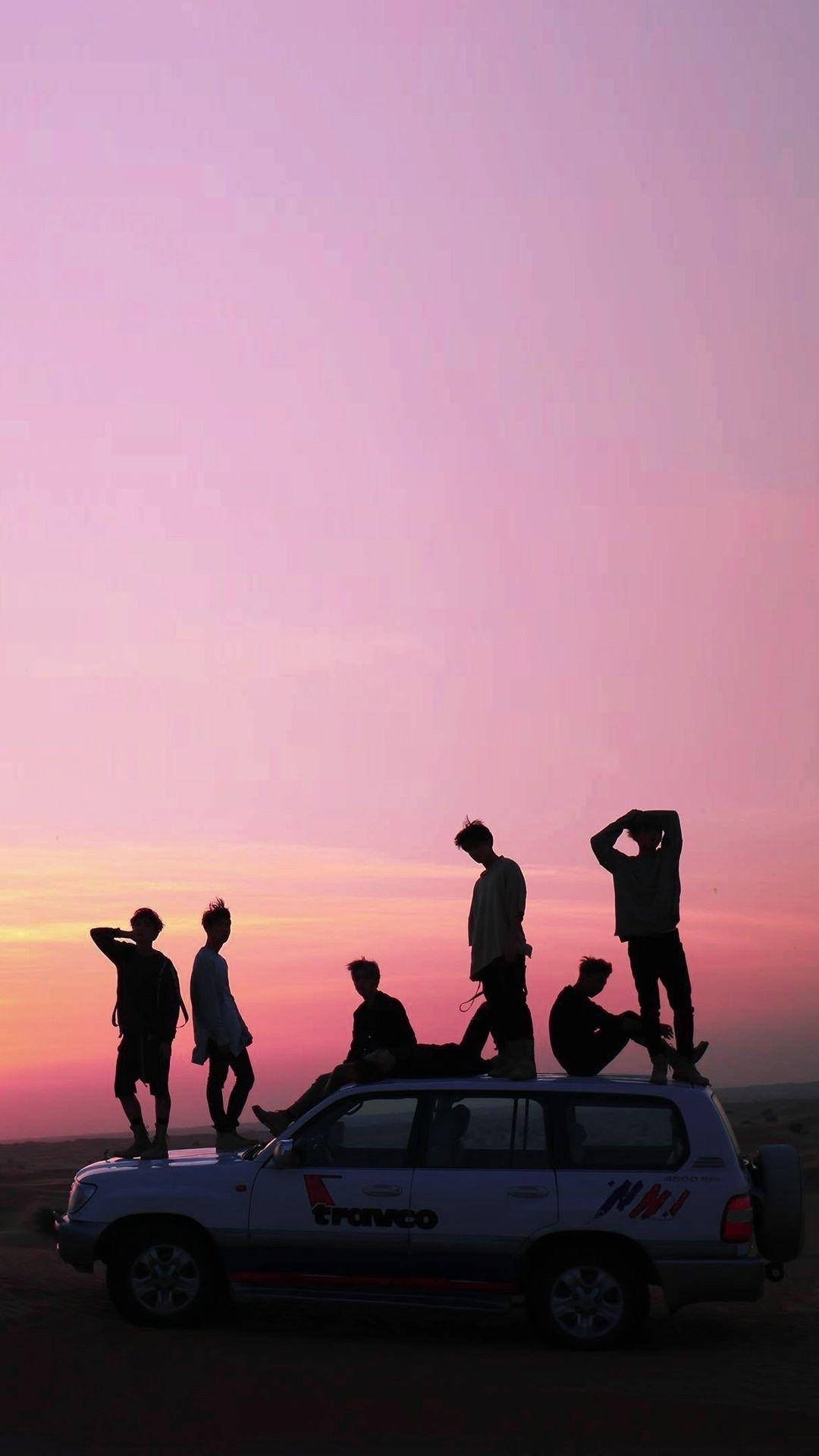 ล็อคสกรีนพระอาทิตย์ตกสีชมพู BTS วอลเปเปอร์