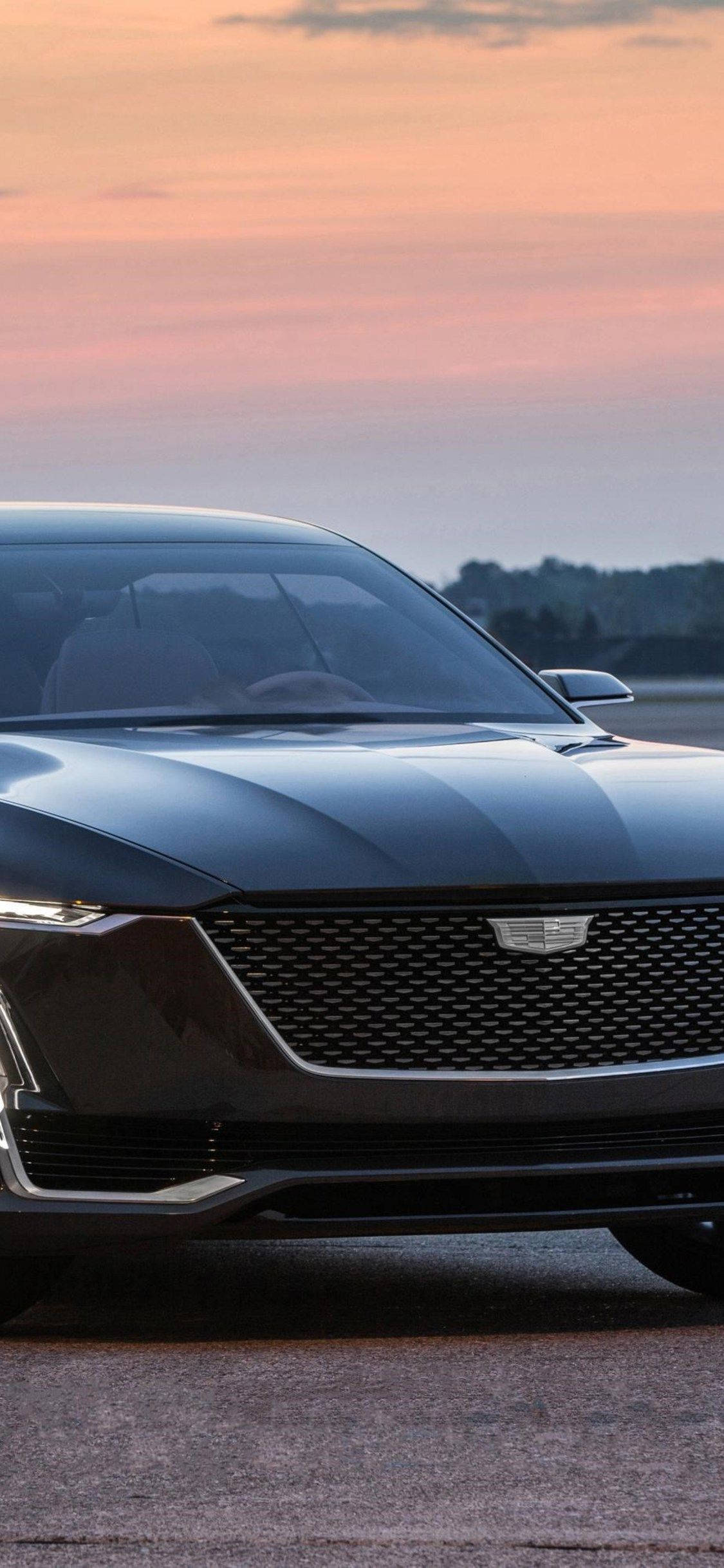 Cadillac ตอนพระอาทิตย์ตก จาก iPhone วอลเปเปอร์