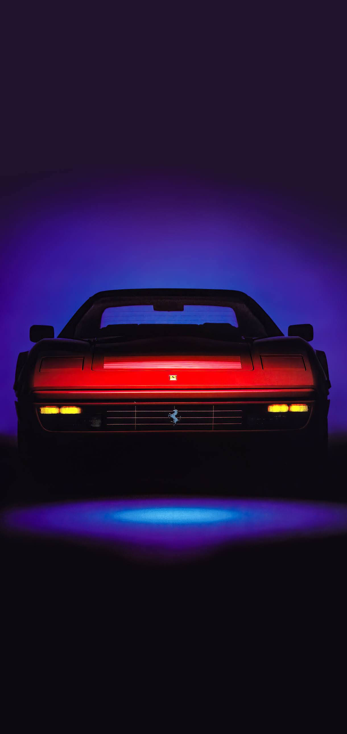 Ferrari สีแดงรุ่น 1989 328 GTS บนโทรศัพท์สุนทรียะสีน้ำเงิน วอลเปเปอร์