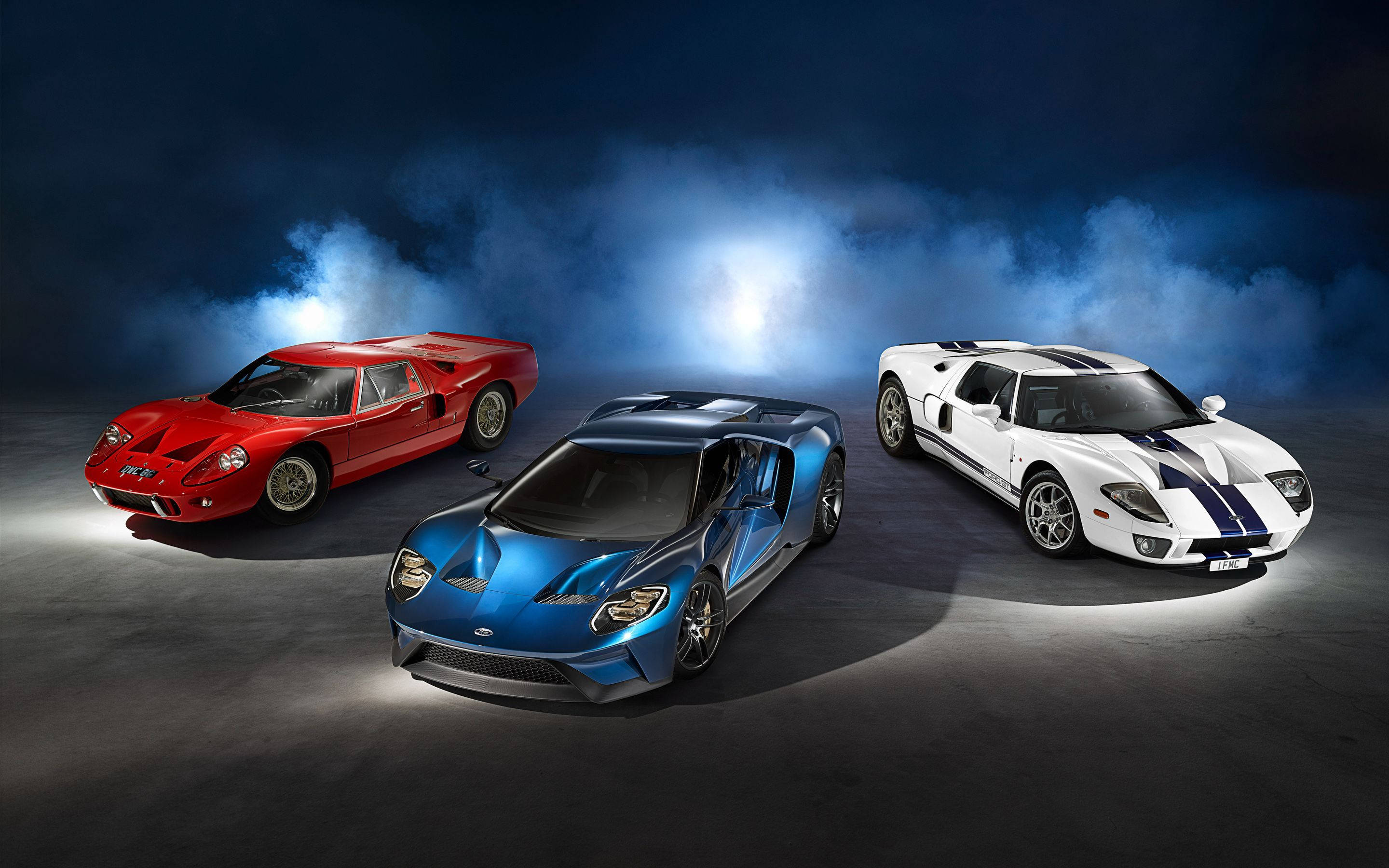Ford GT สีแดง น้ำเงิน และขาว วอลเปเปอร์