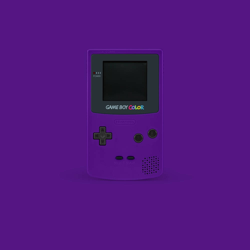 เครื่องเกมพกพาสีม่วงวินเทจ Game Boy Color วอลเปเปอร์