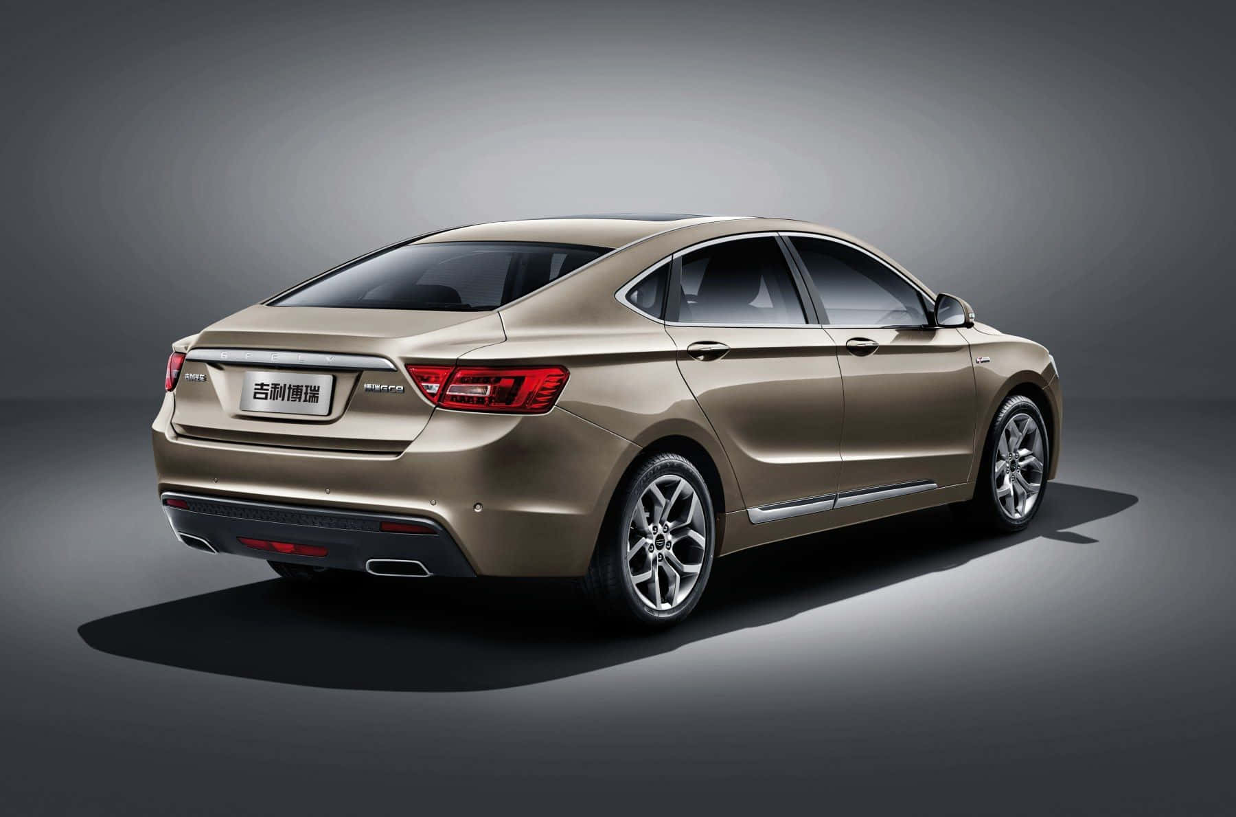 รถยนต์นั่งส่วนบุคคล Geely เรียบลื่นกำลังเคลื่อนที่ วอลเปเปอร์