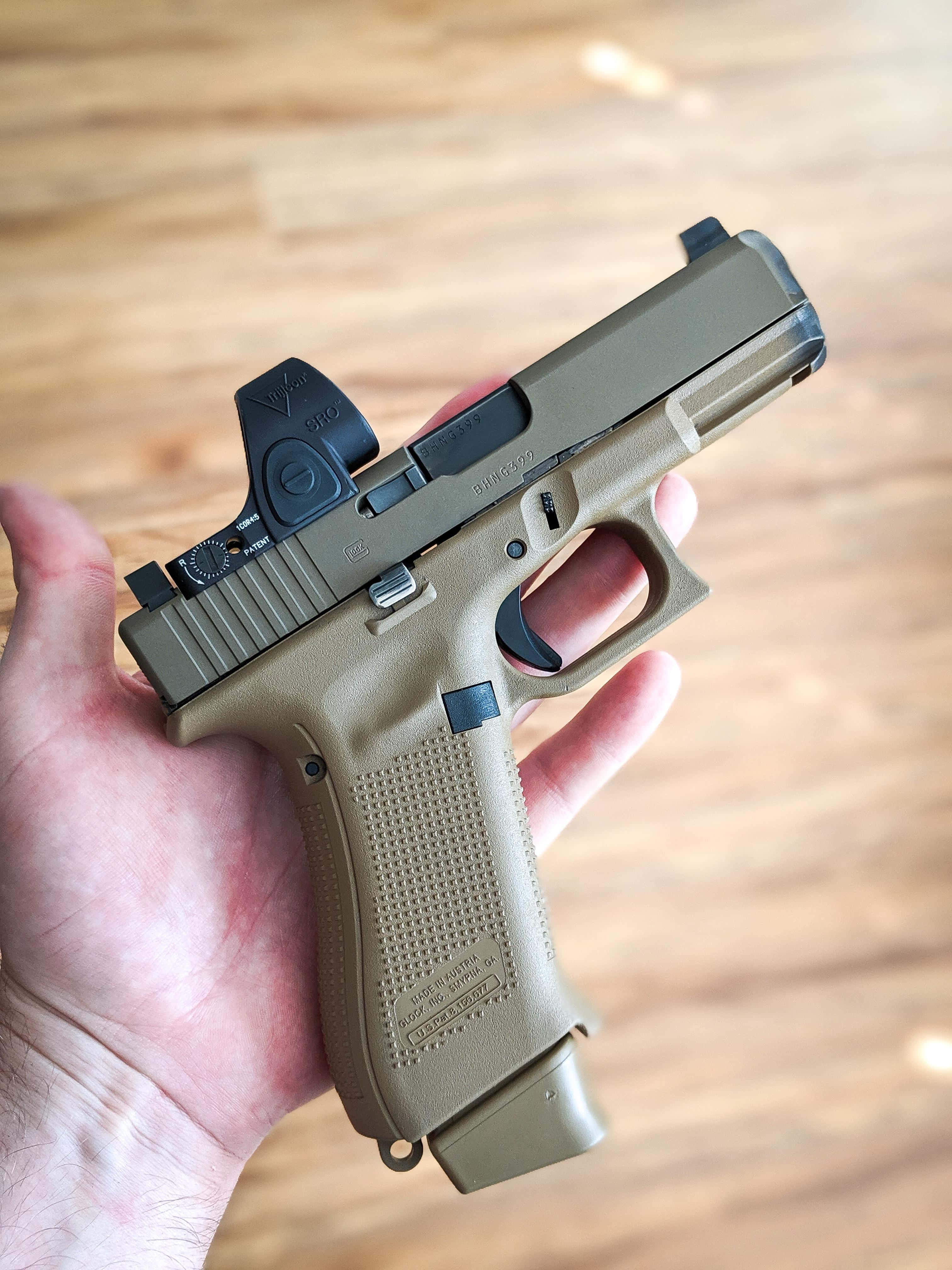 ภาพระยะใกล้ของ Glock 19 วอลเปเปอร์