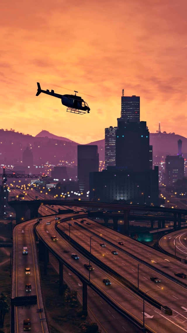 พื้นหลัง GTA เฮลิคอปเตอร์บินเหนือลอสซานโตส วอลเปเปอร์