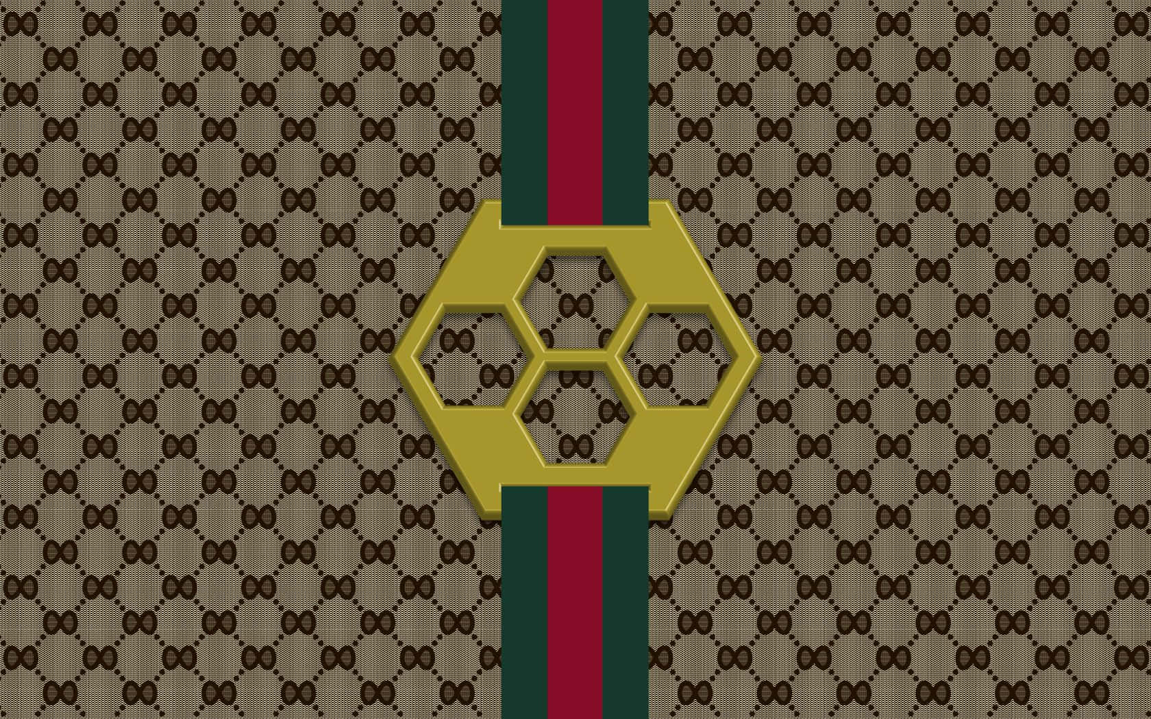 พื้นหลังสีทองและน้ำตาลสุดคลาสสิกของ Gucci วอลเปเปอร์