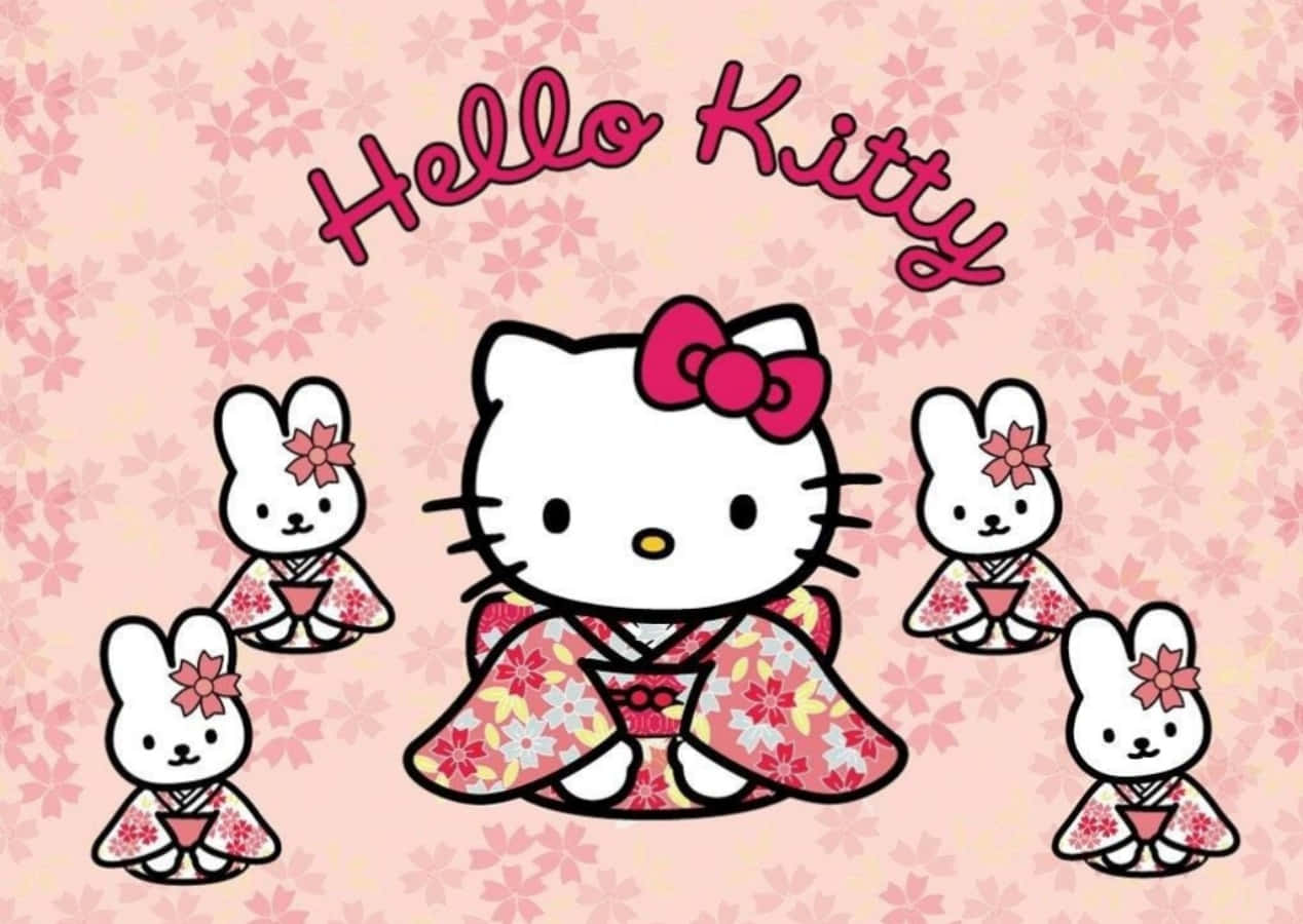 ลวดลาย Hello Kitty บนแล็ปท็อปกับกระต่ายในชุดกิโมโน วอลเปเปอร์