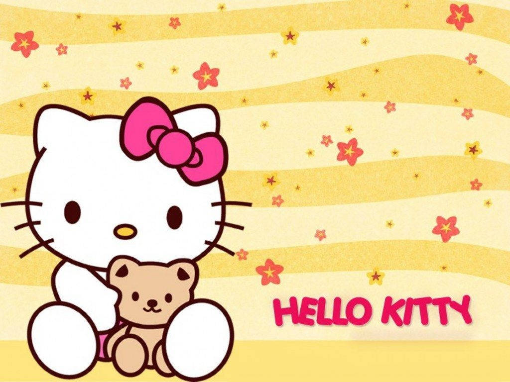 Hello Kitty บนพื้นหลังสีเหลืองน่ารัก วอลเปเปอร์