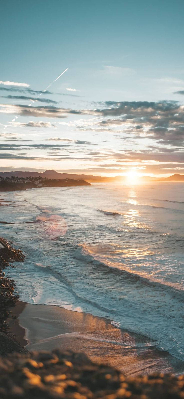 iPhone 12 Pro ชายหาดพระอาทิตย์ตก วอลเปเปอร์