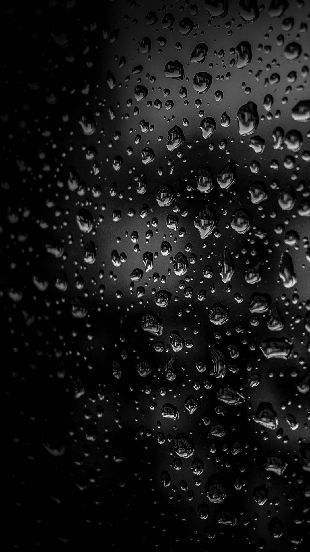 ฝนตกบนกระจก iPhone สีเข้ม วอลเปเปอร์