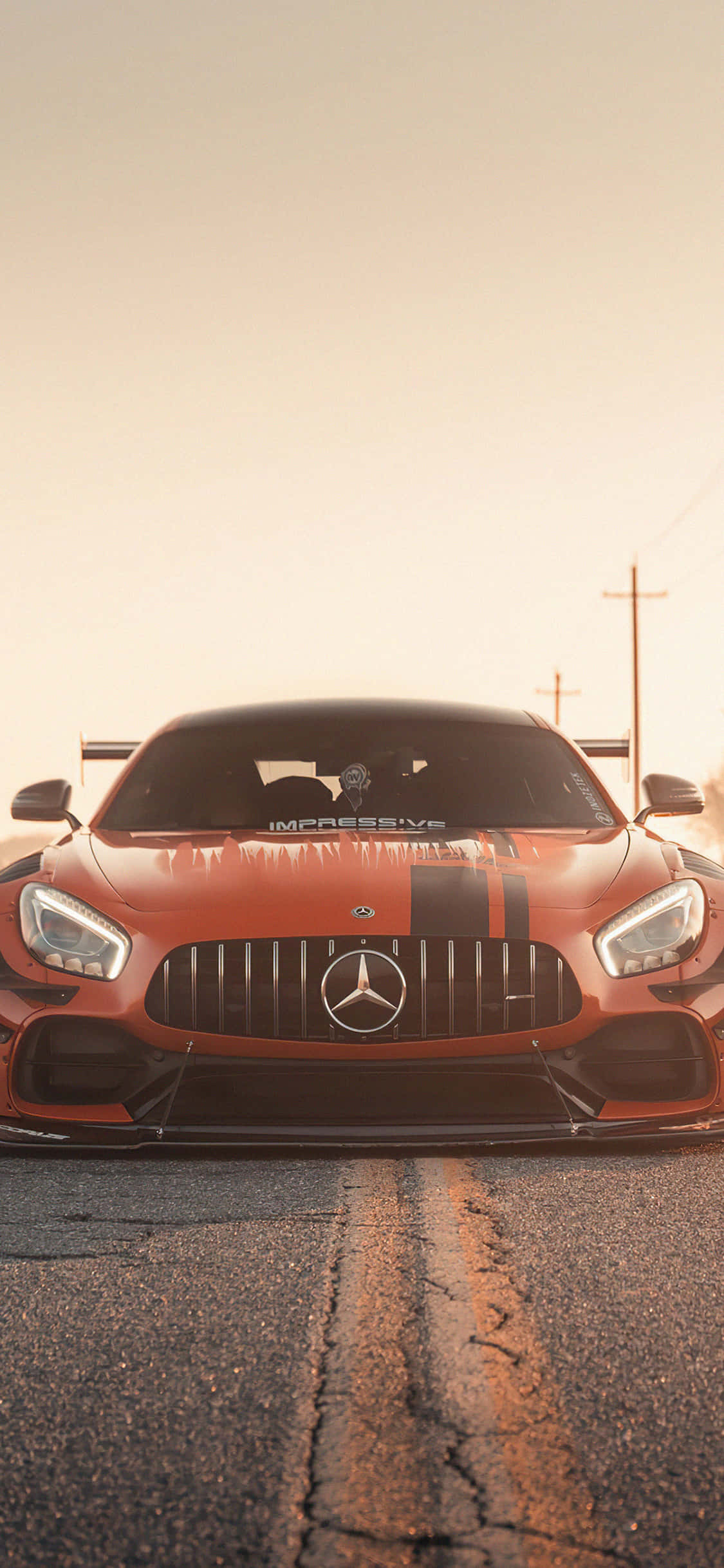 พื้นหลัง iPhone X AMG GT-R ด้านหน้าสีส้ม AMG GT วอลเปเปอร์