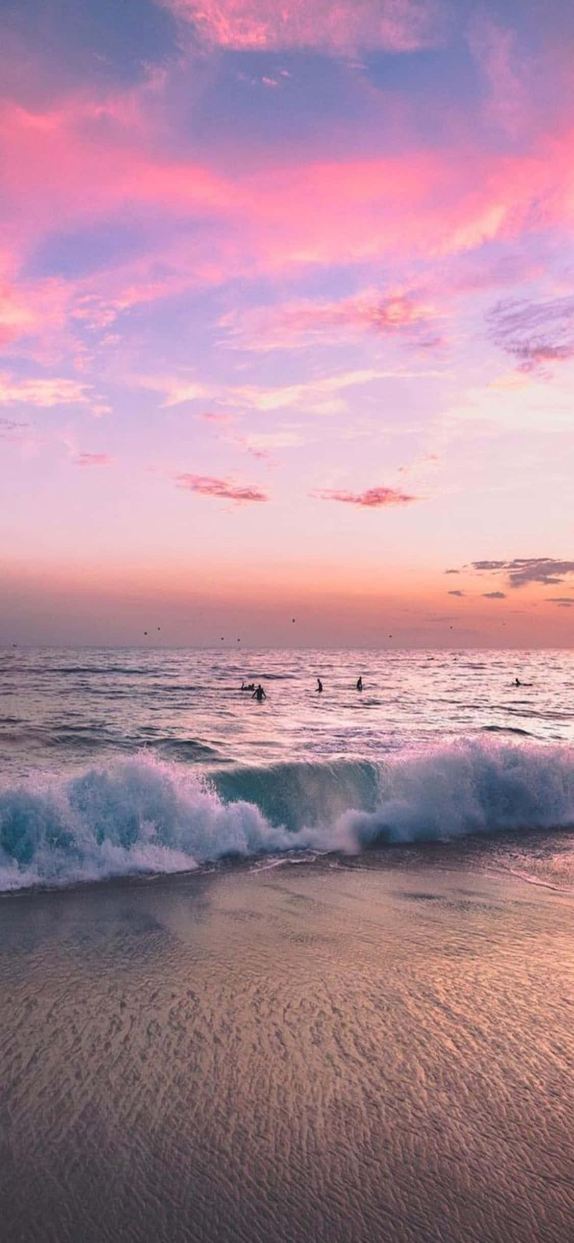 เพลิดเพลินกับความสงบ: พื้นหลังชายหาด iPhone X วอลเปเปอร์