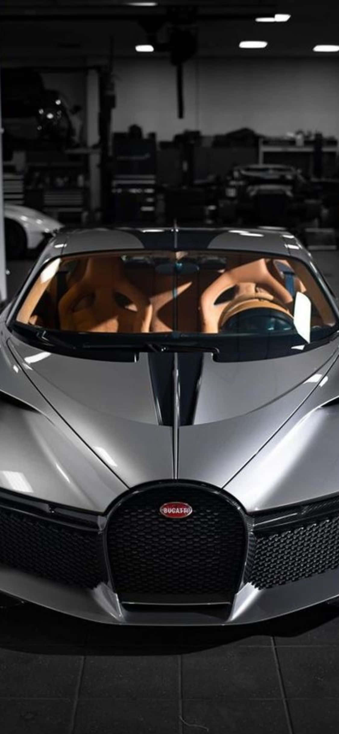 ความหรูหราที่ไม่ซ้ำใคร: สำรวจโลกด้วย iPhone Xs และ Bugatti ส่วนตัว วอลเปเปอร์