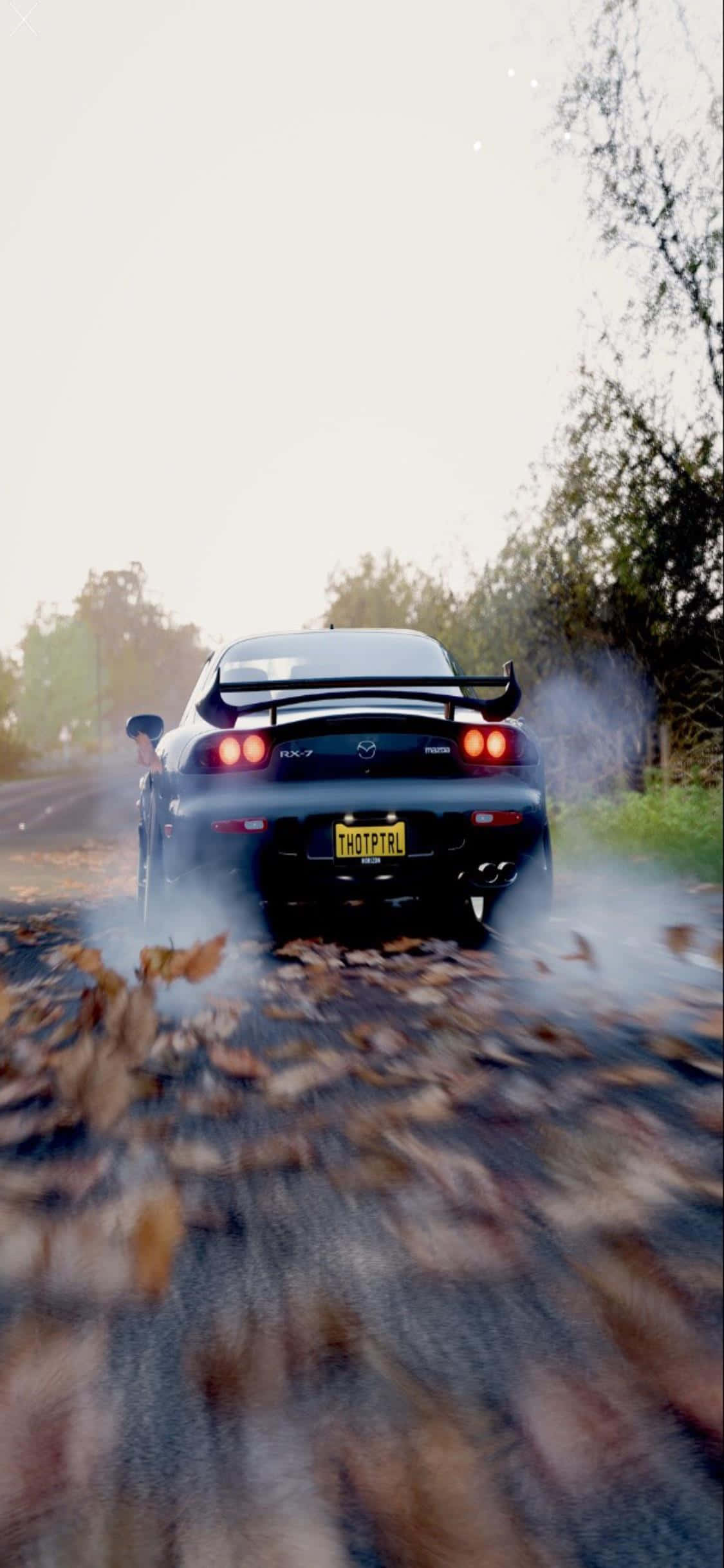 เพลิดเพลินกับกราฟิกคุณภาพสูงและประสบการณ์ที่ดื่มด่ำกับ iPhone Xs และ Forza Horizon 4 วอลเปเปอร์