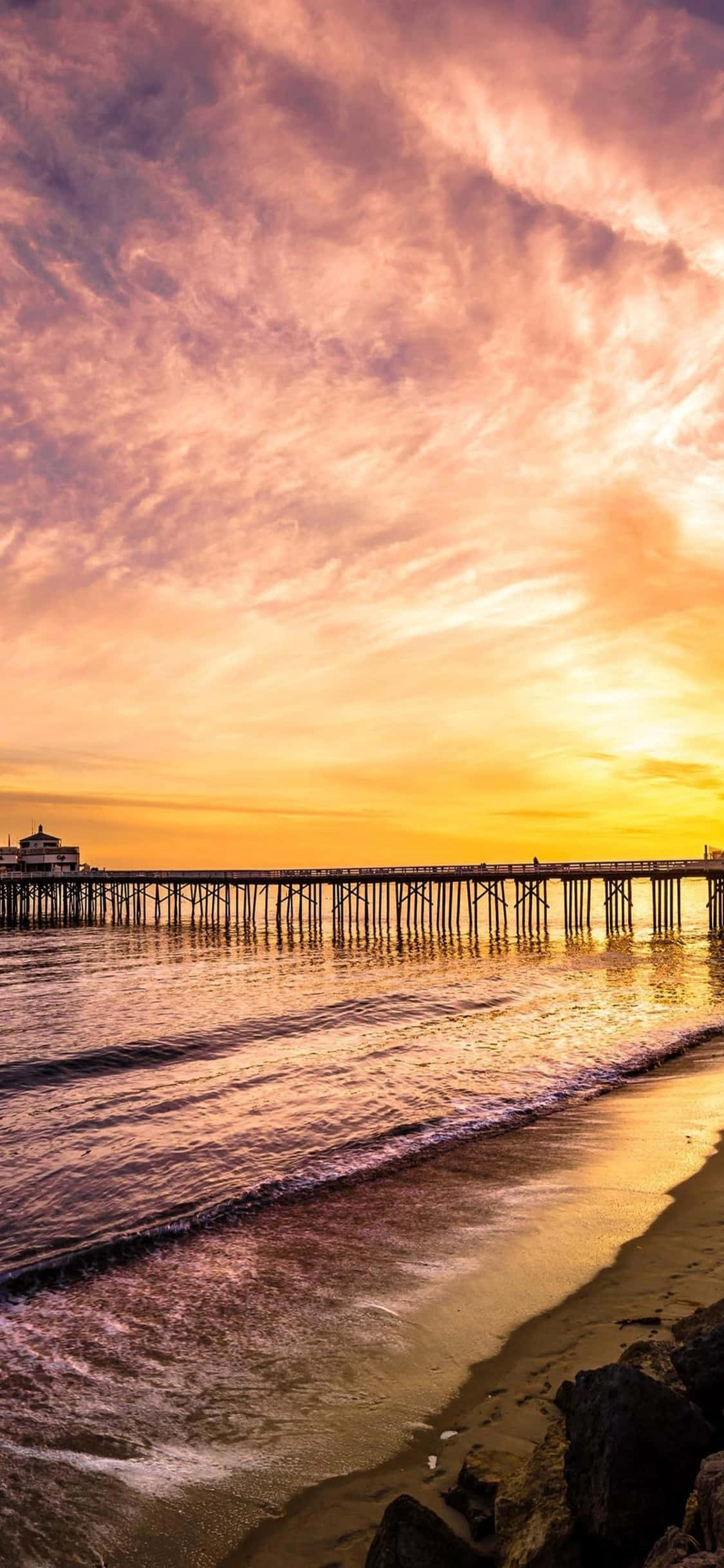 เพลิดเพลินกับบรรยากาศชายหาดขณะใช้ iPhone Xs Malibu รุ่นใหม่ล่าสุด วอลเปเปอร์