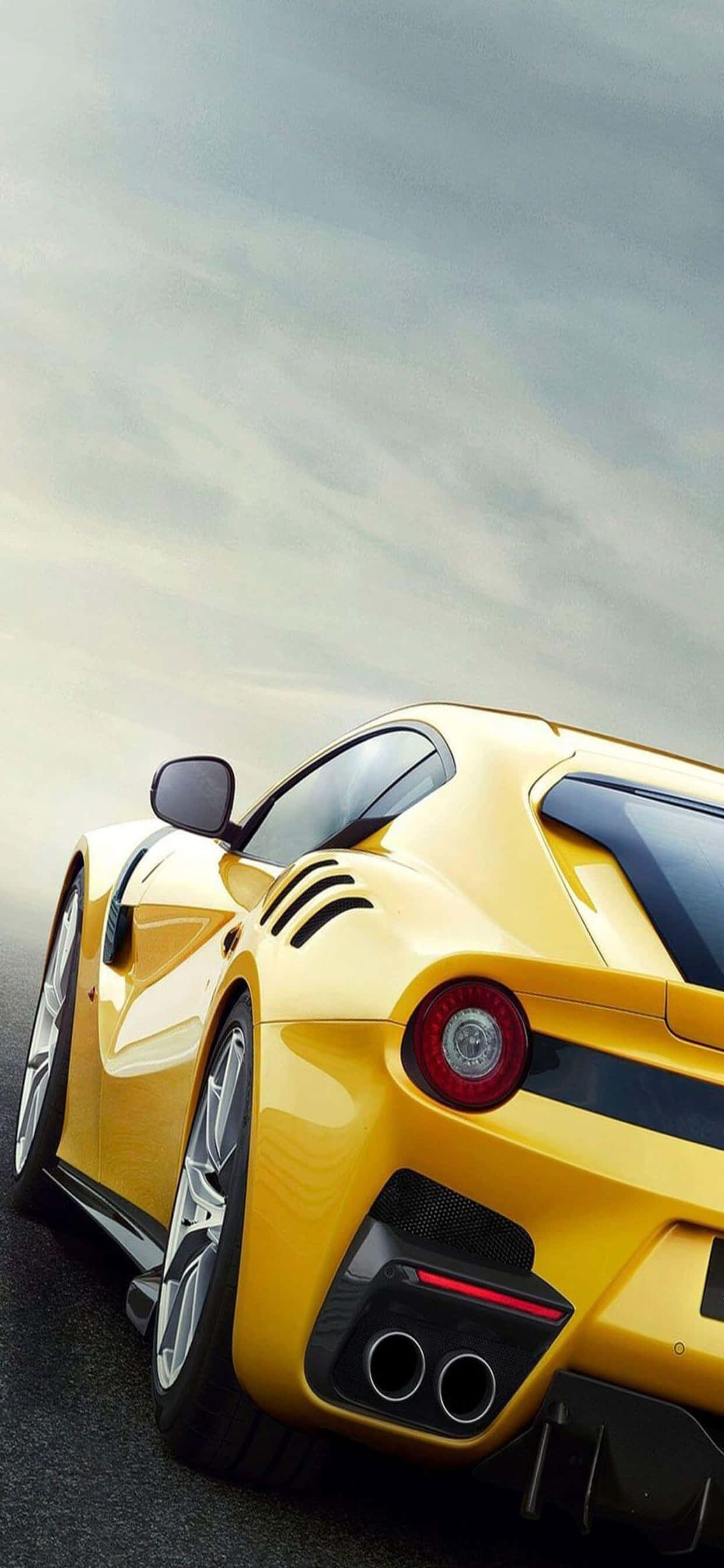พื้นหลัง iPhone Xs Max Ferrari สีเหลือง Ferrari F12tdf วอลเปเปอร์