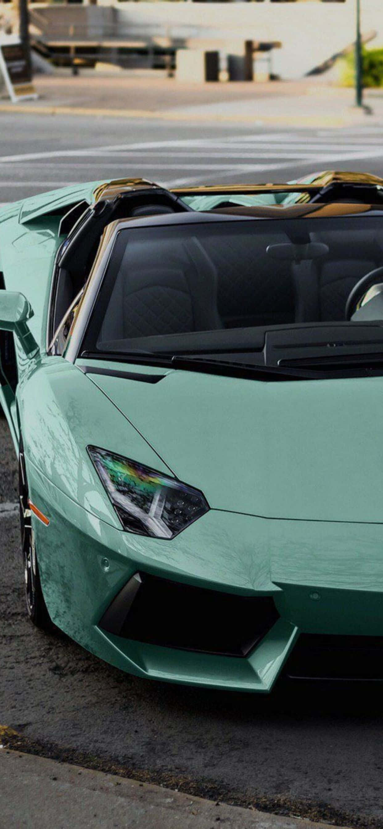 iPhone XS Max Lamborghini พื้นหลังสีฟ้าอ่อน วอลเปเปอร์