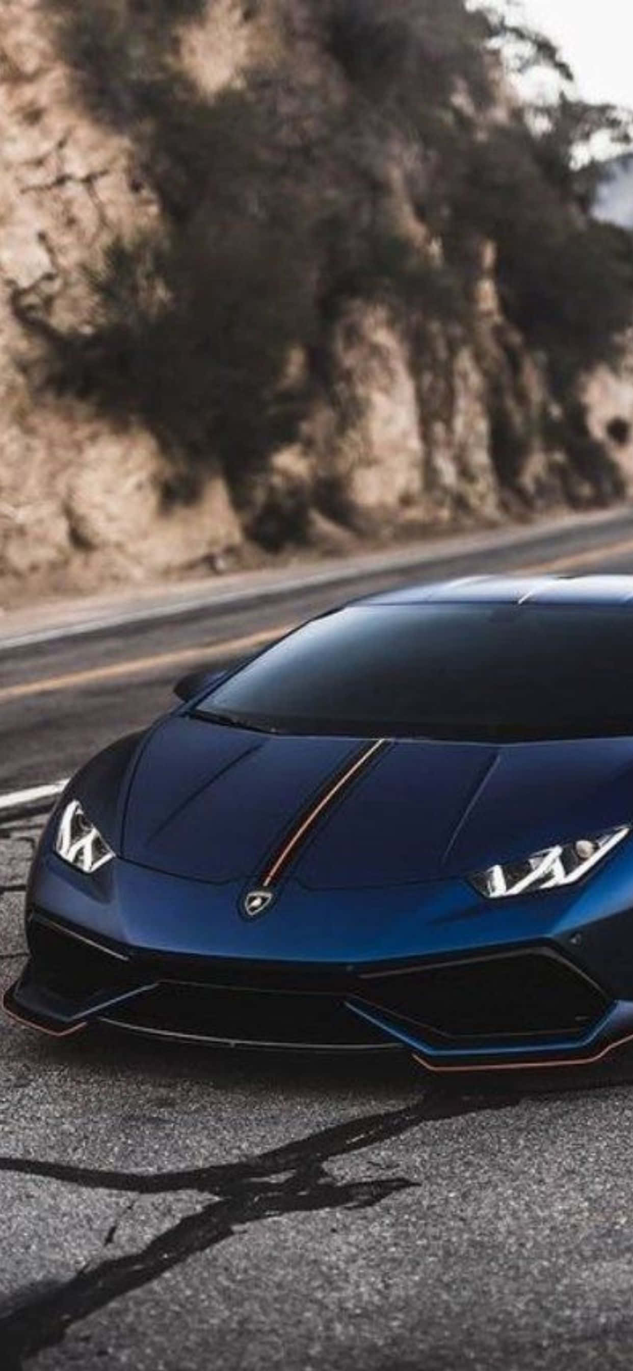 พื้นหลัง iPhone XS Max Lamborghini Huracan สีน้ำเงิน วอลเปเปอร์