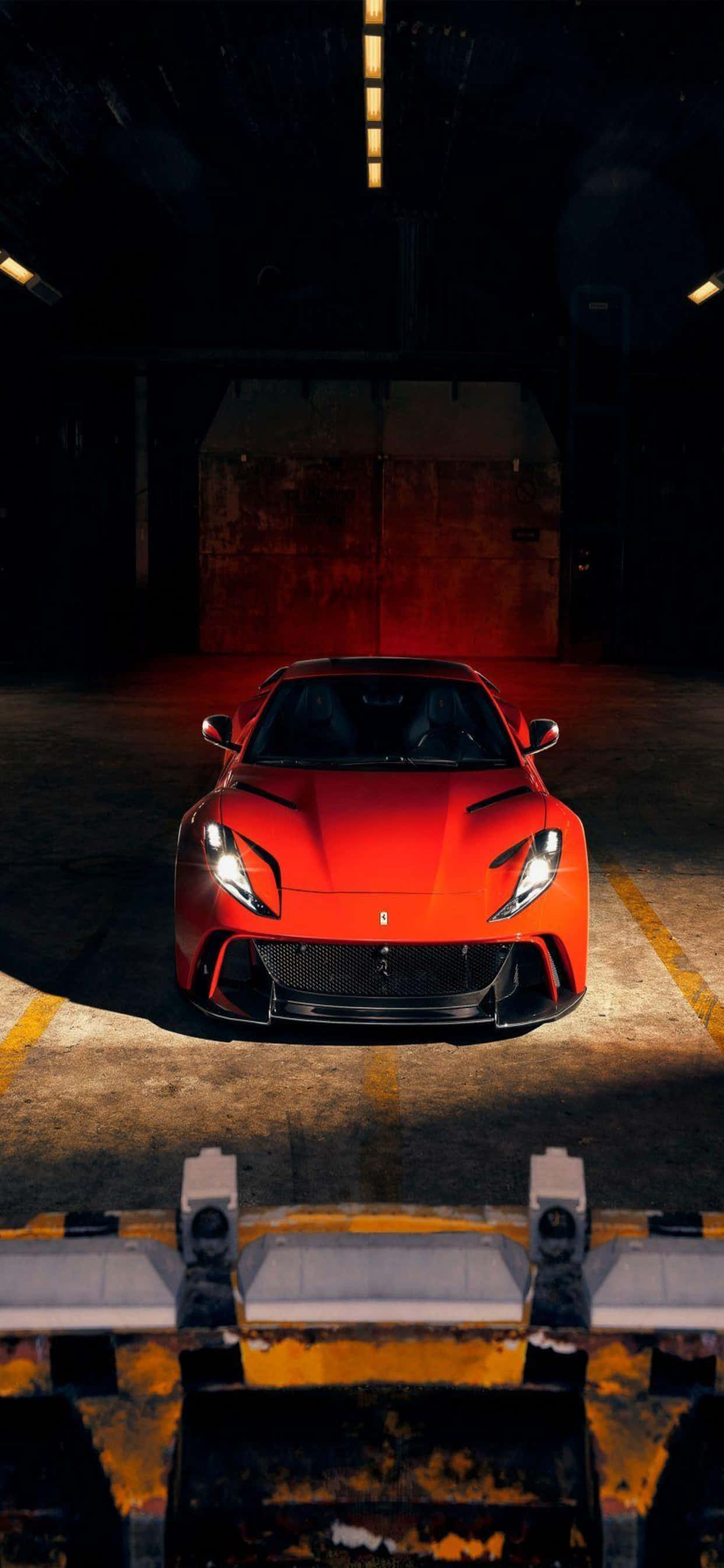 iPhone Xs Max พื้นหลัง Ferrari สีแดง Ferrari 812 Superfast ในโกดัง วอลเปเปอร์