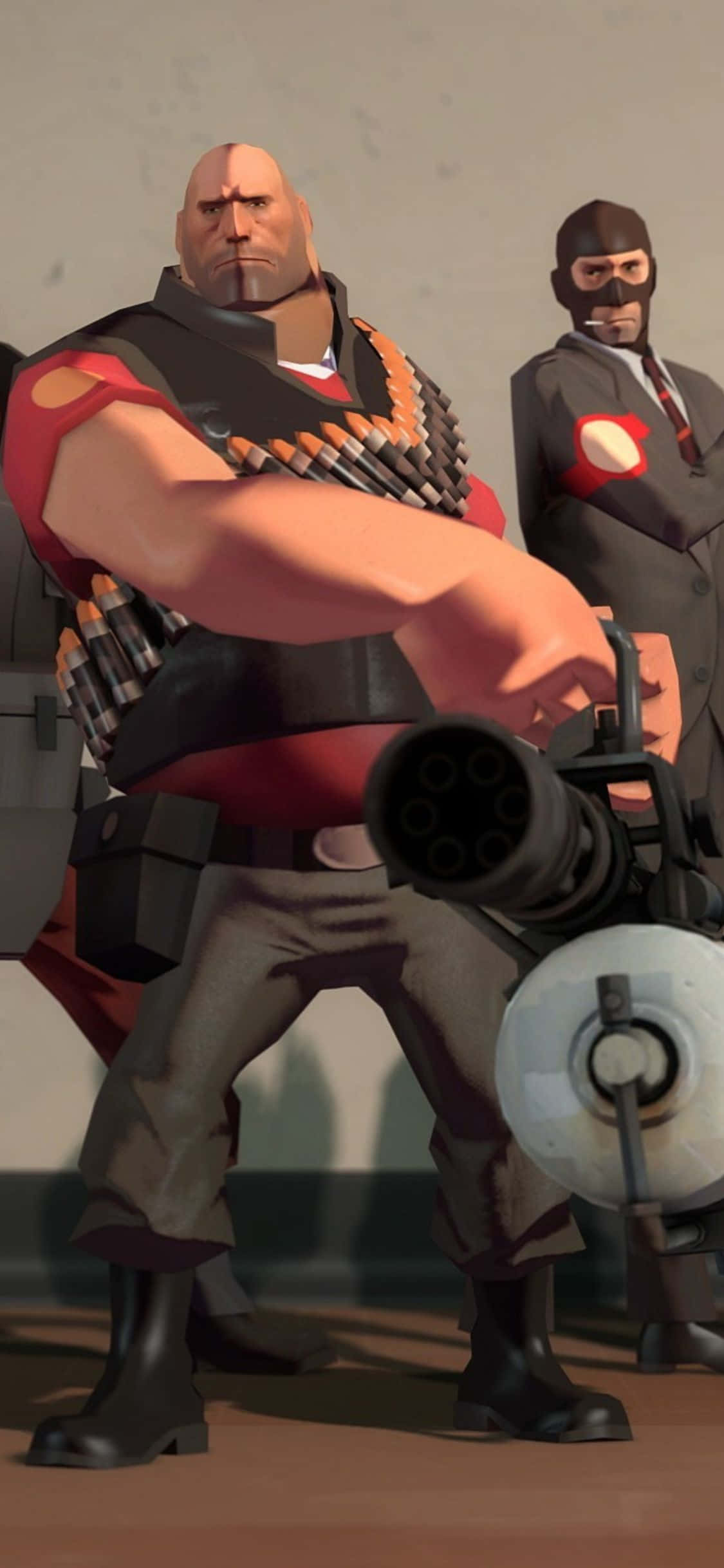 พื้นหลัง iPhone XS Team Fortress 2 Heavy กับ Spy วอลเปเปอร์