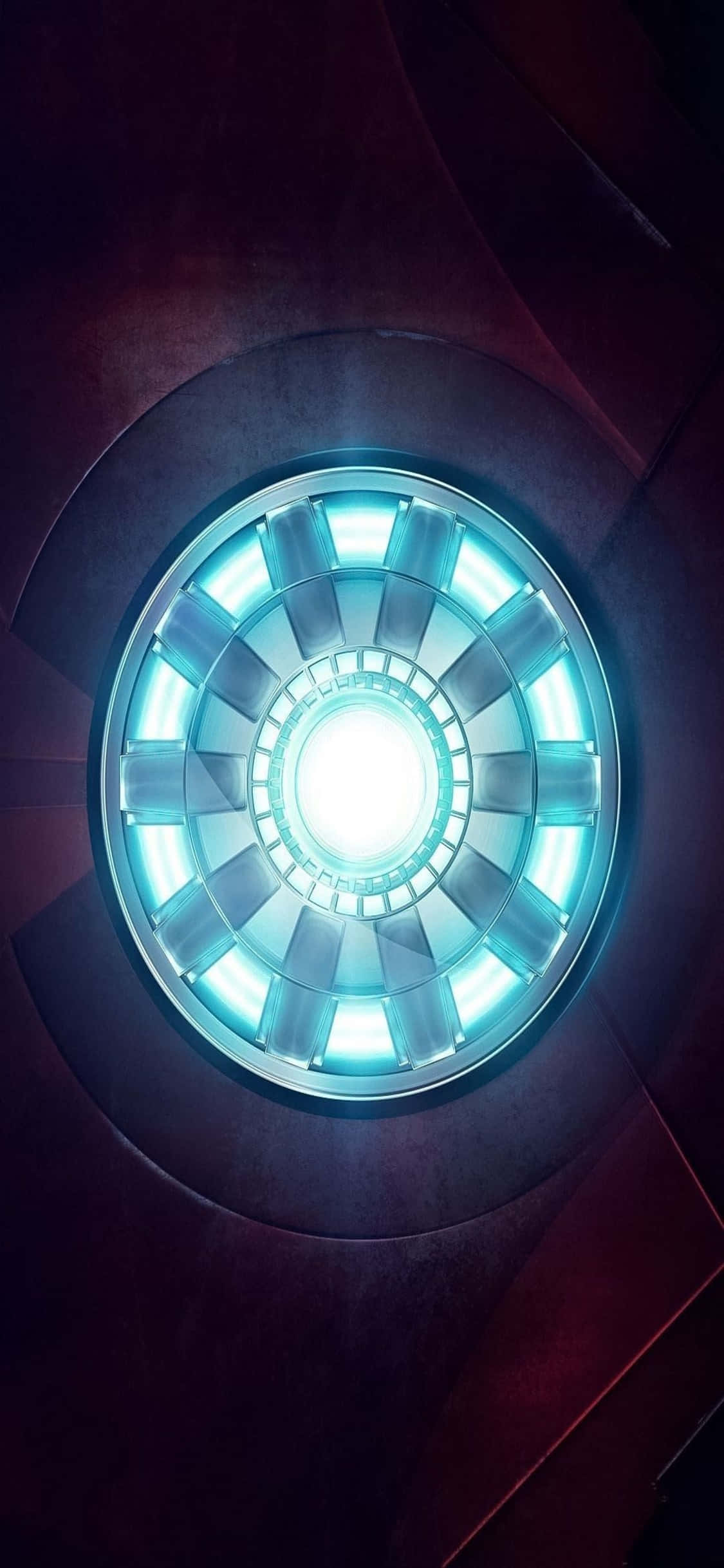 พื้นหลัง Iron Man สำหรับ iPhone X แสดงเครื่องปฏิกรณ์อก วอลเปเปอร์