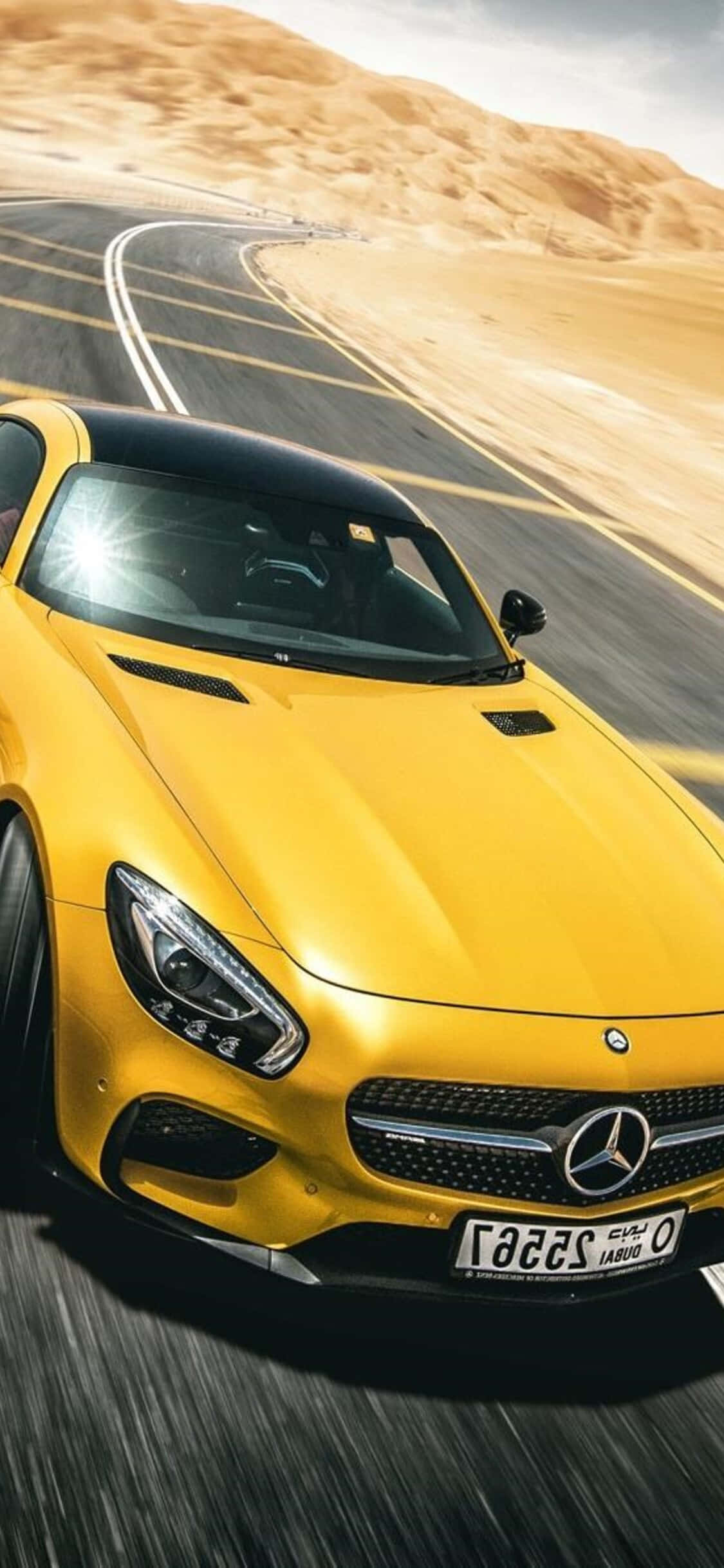 พื้นหลัง Mercedes AMG GT สีเหลืองสำหรับ iPhone Xs วอลเปเปอร์