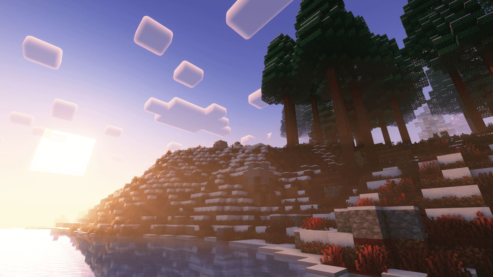 พระอาทิตย์ตกในฤดูหนาวของ Minecraft ข้างป่าละเมาะ วอลเปเปอร์