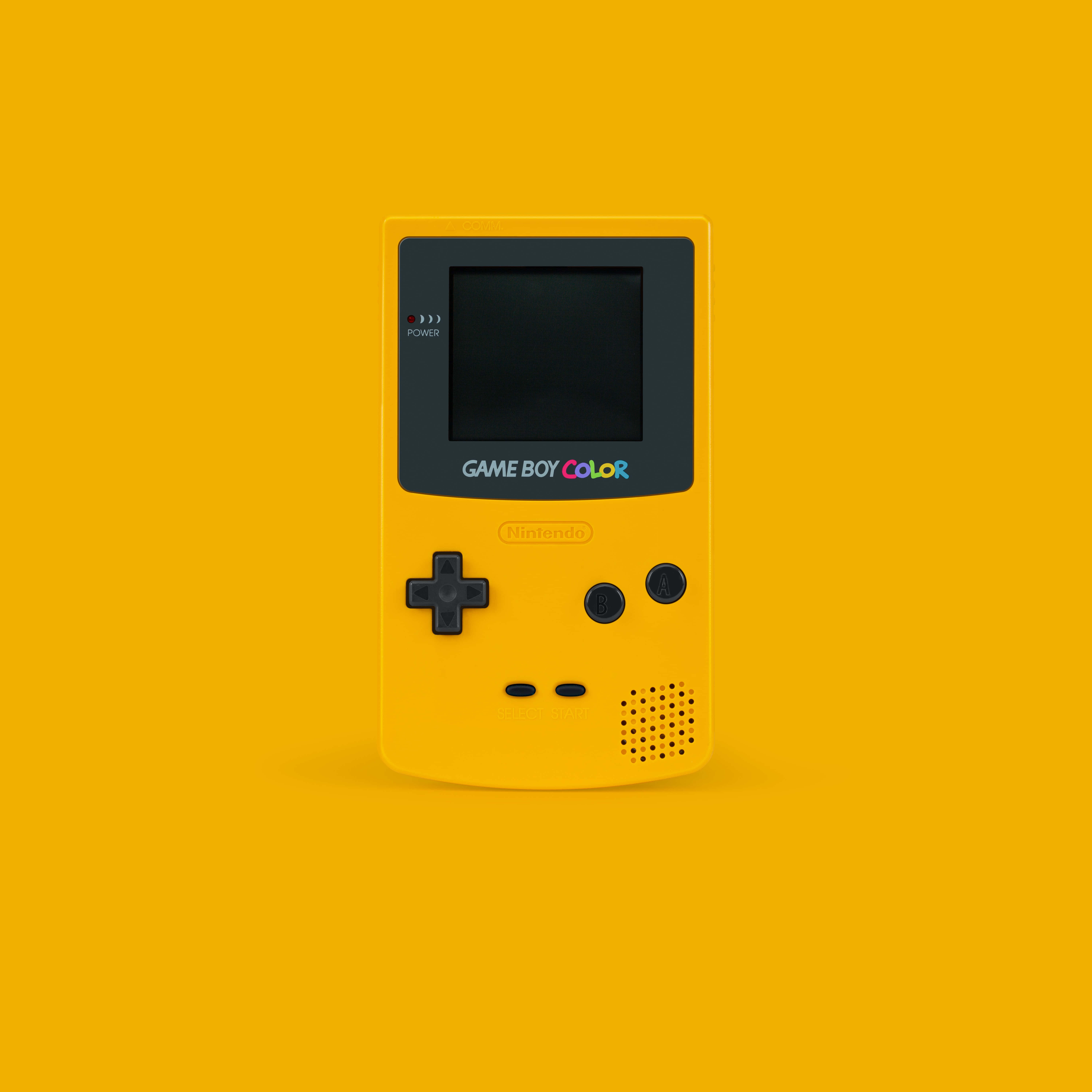 พื้นหลังสีเหลืองของ Nintendo Game Boy Color วอลเปเปอร์