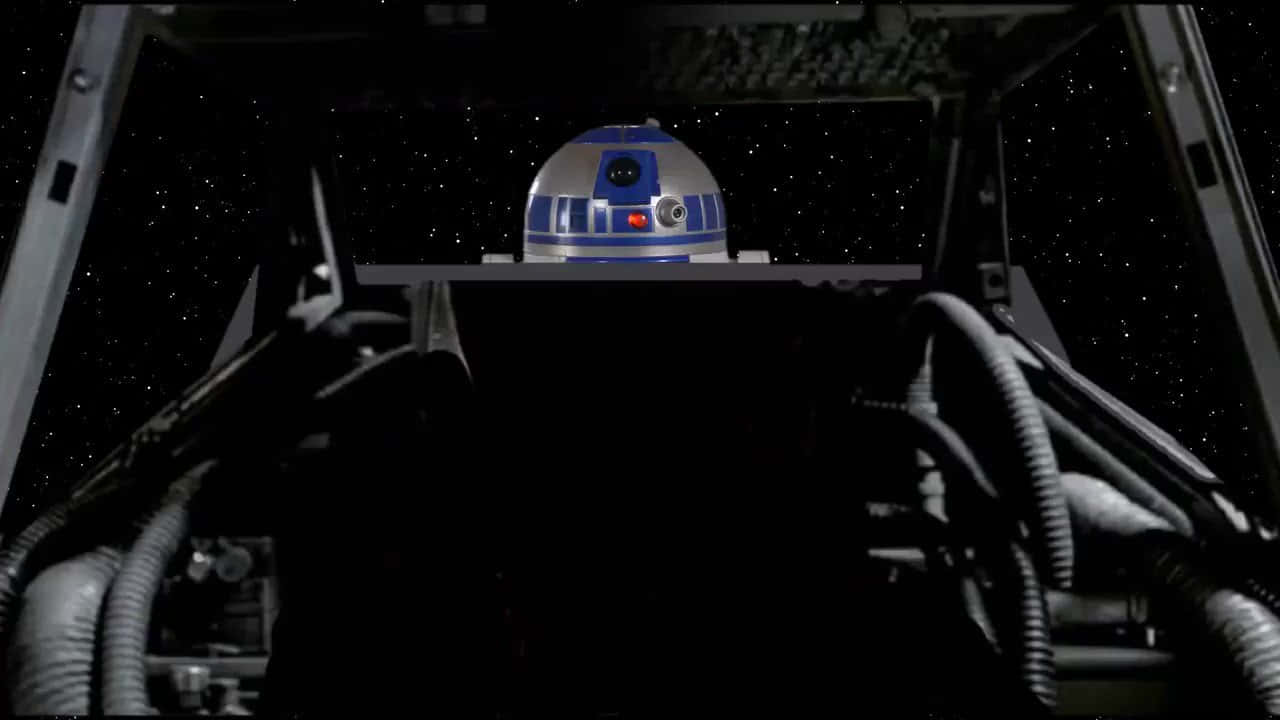 พื้นหลัง Star Wars Zoom R2D2 ในอวกาศ วอลเปเปอร์