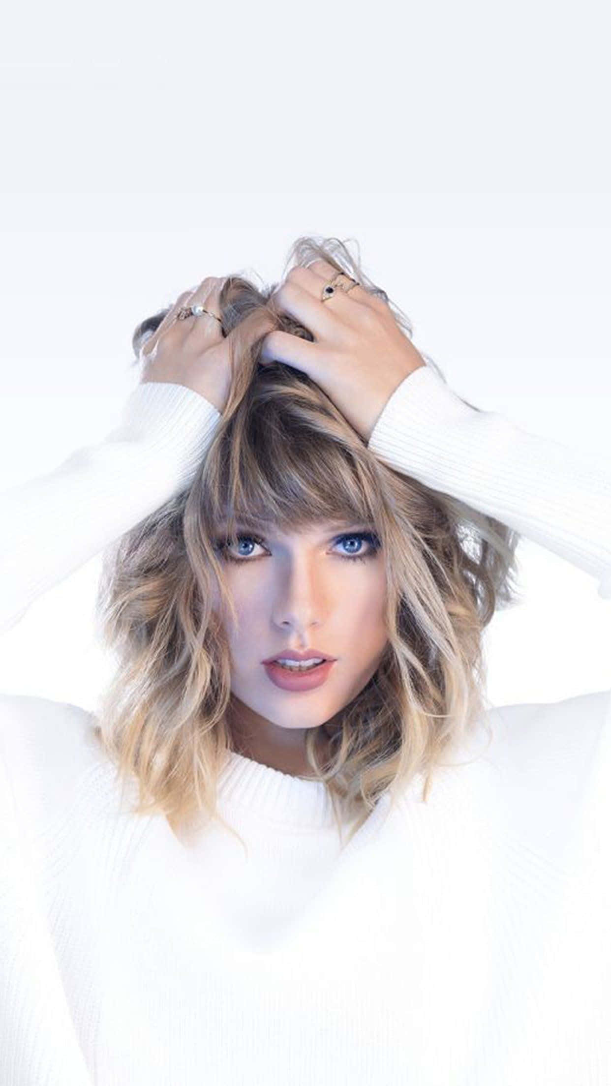 Taylor Swift iPhone สีขาว วอลเปเปอร์