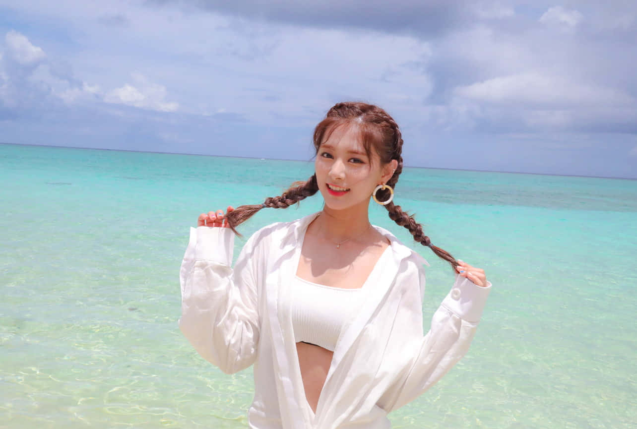 TWICE สมาชิกโพสท่าท่ามกลางชุดสุดหรู วอลเปเปอร์