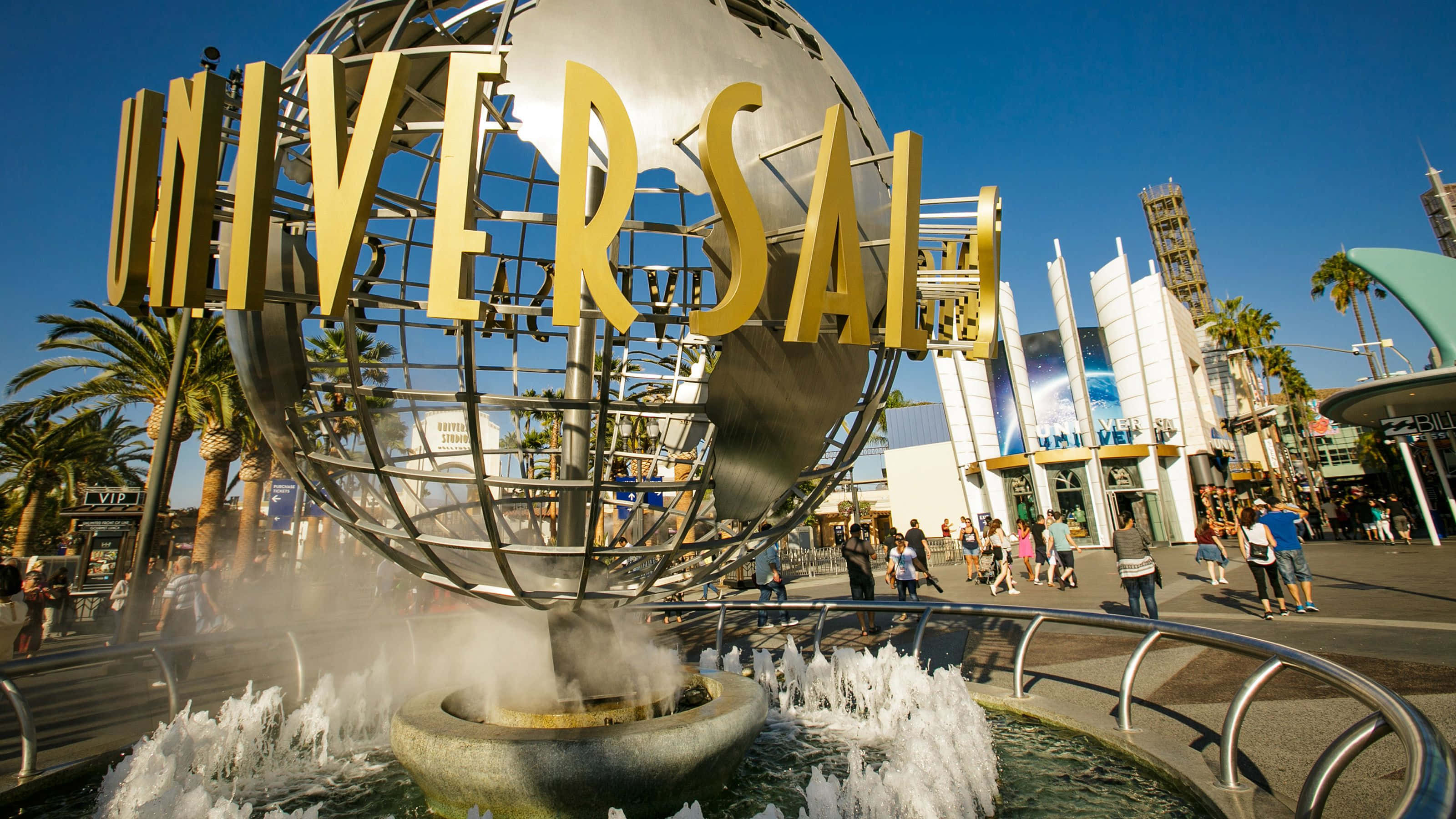 ภาพน้ำพุสวยงามสีทองของ Universal Studios วอลเปเปอร์