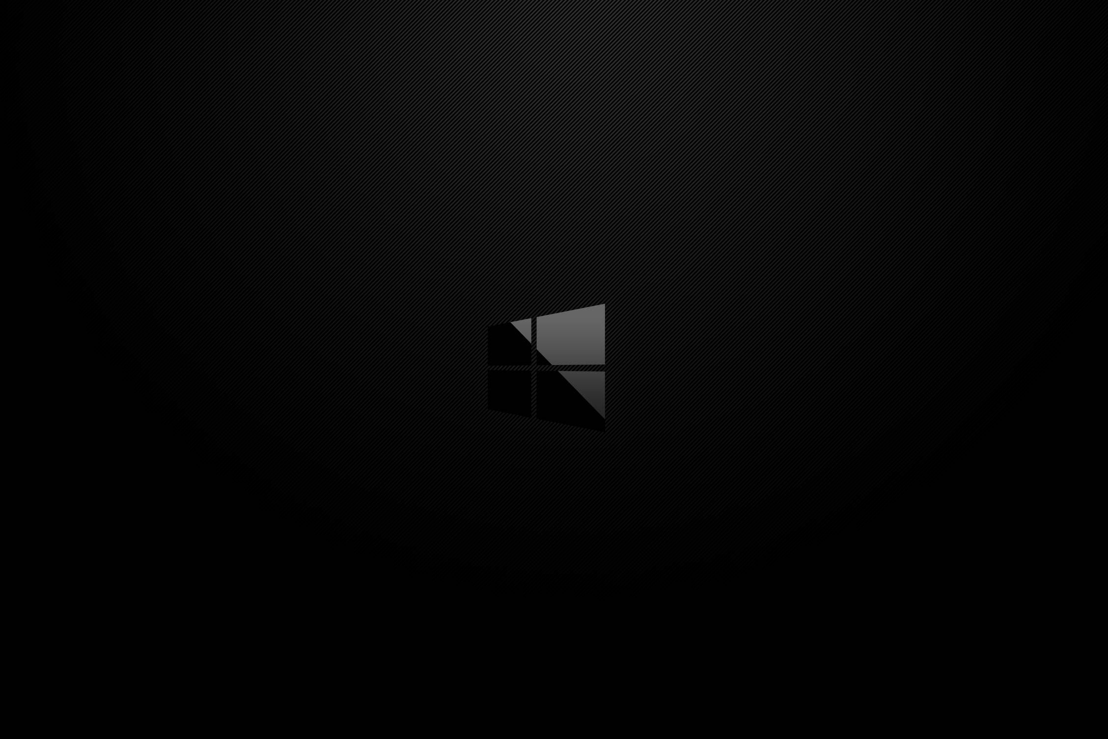 โลโก้ Windows สไตล์มินิมอลสีเข้ม วอลเปเปอร์