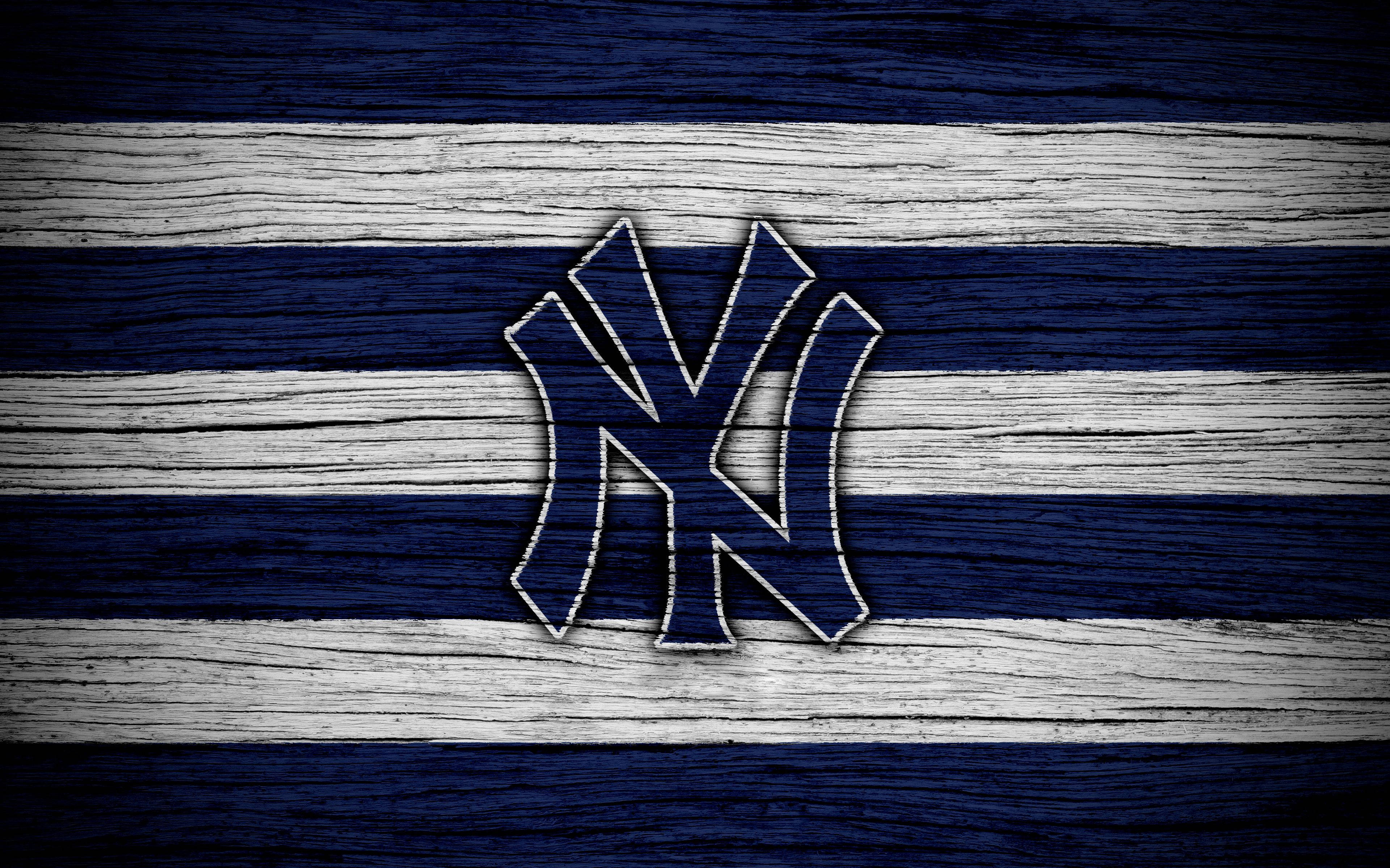 โลโก้ Yankees บนแผ่นไม้ วอลเปเปอร์