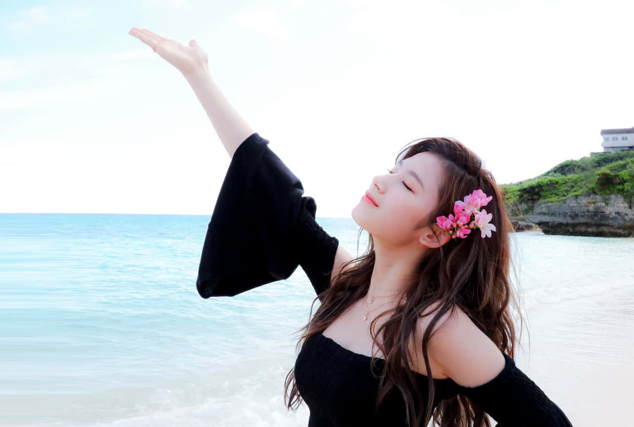 การปรากฏตัวสุดตระการตาบนพรมแดงของเซนเซชันวงเกิร์ลกรุ๊ปเคป๊อป Twice วอลเปเปอร์