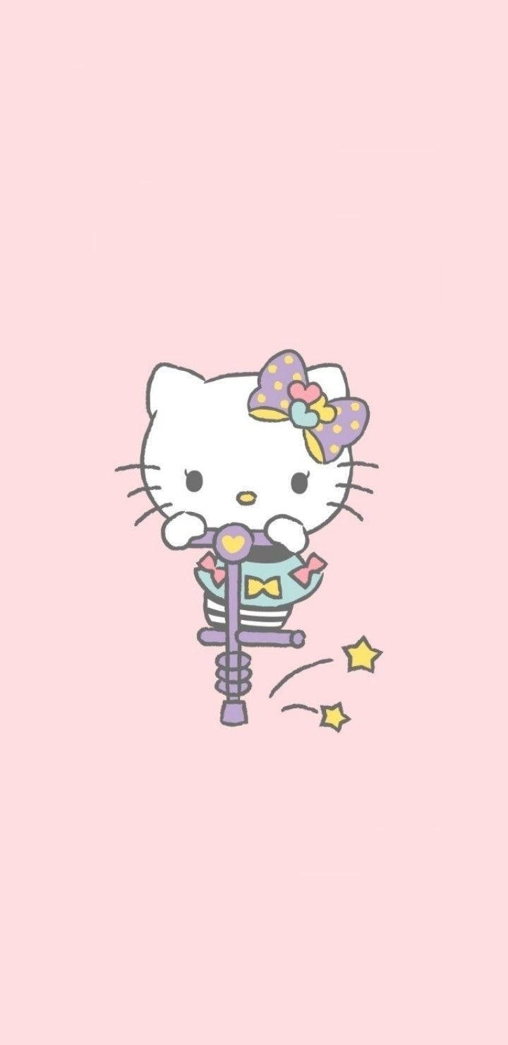 ความน่ารักของเฮลโลคิตตี้ในขณะเล่น วอลเปเปอร์