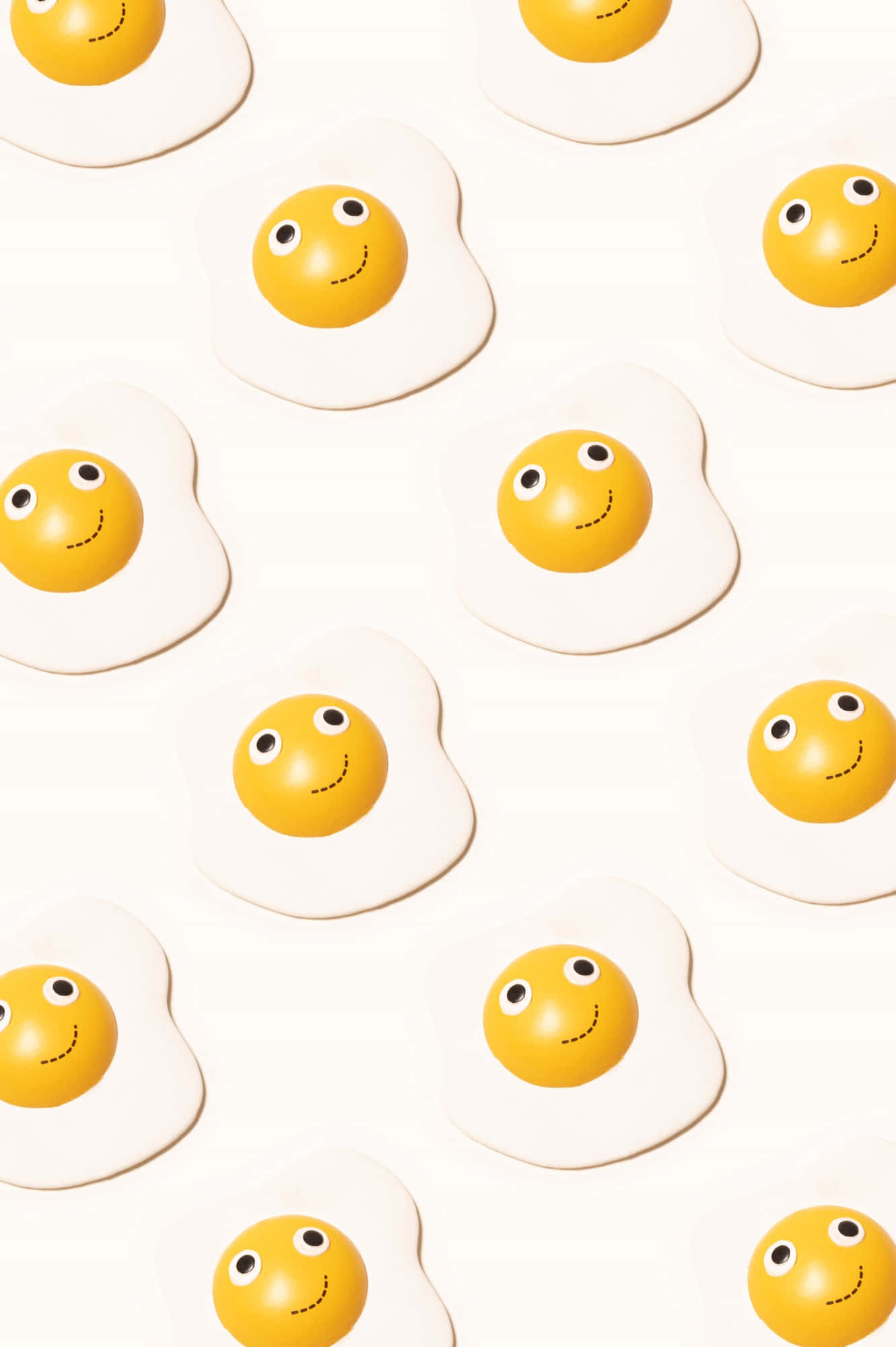 คำอธิบายภาพ: อิโมจิรอยยิ้มมีชีวิตผสานกับไข่ดาว วอลเปเปอร์