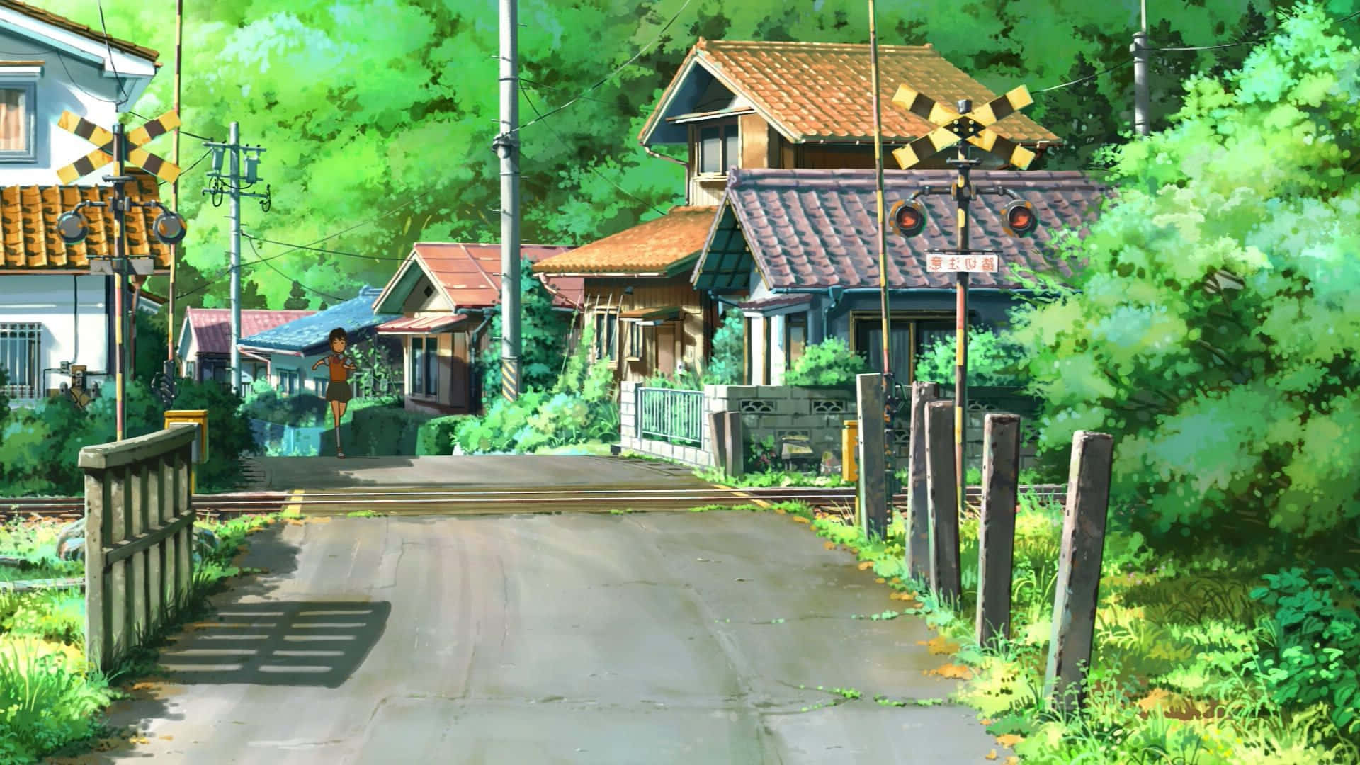 ถนนที่มีบ้านเรือนและรถไฟ วอลเปเปอร์