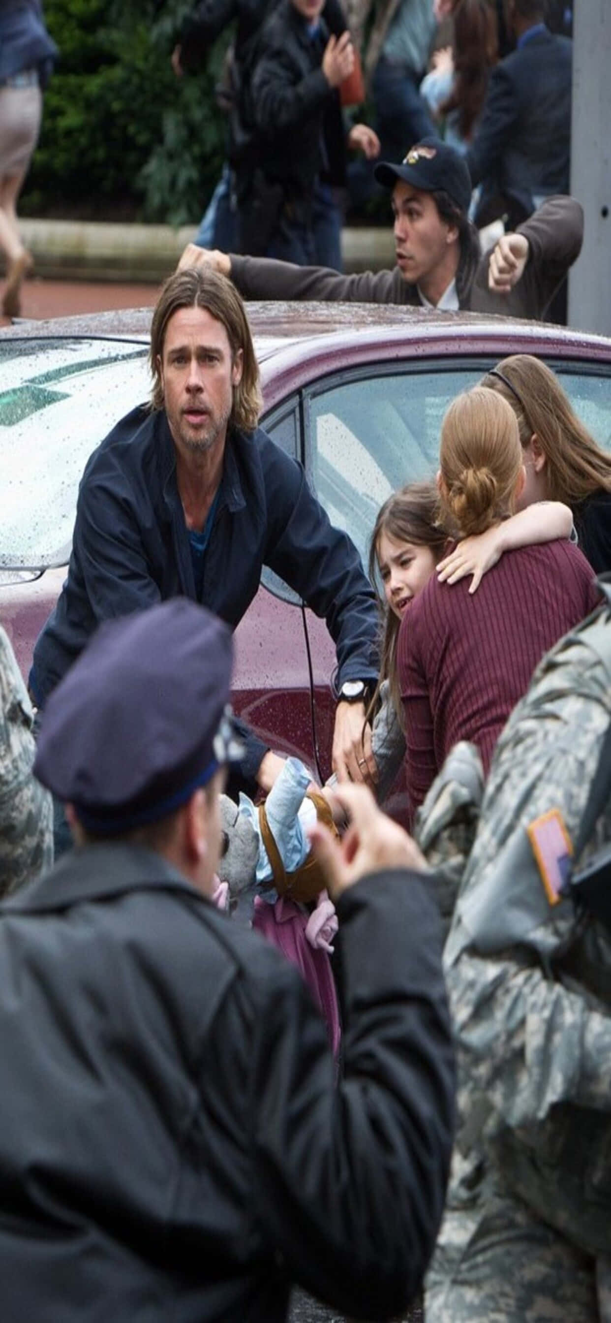 ทิวทัศน์แอ็กชันของ World War Z บนหน้าจอ iPhone XS Max วอลเปเปอร์