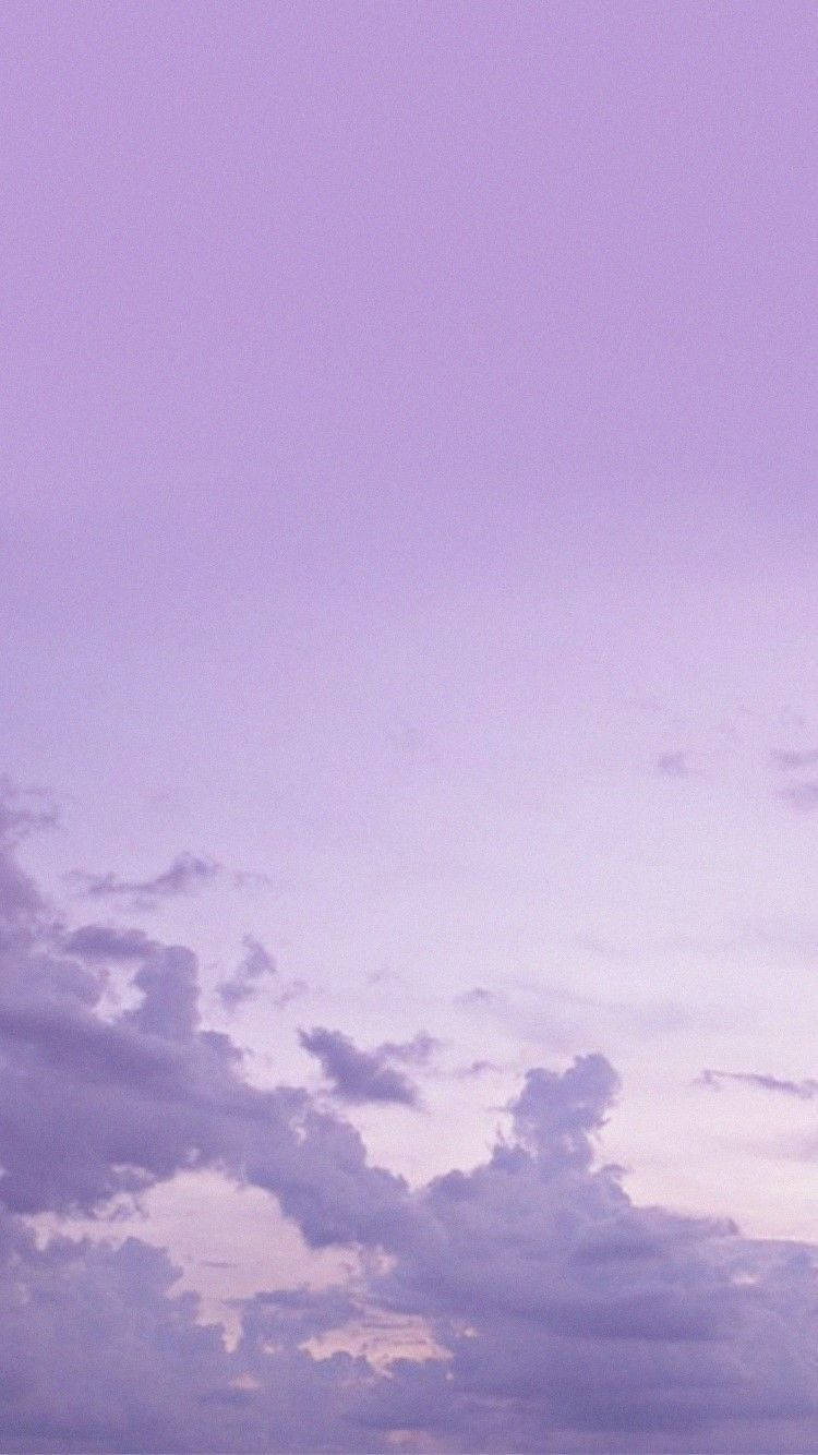 ท้องฟ้ามีเมฆสีม่วงพาสเทล Tumblr วอลเปเปอร์