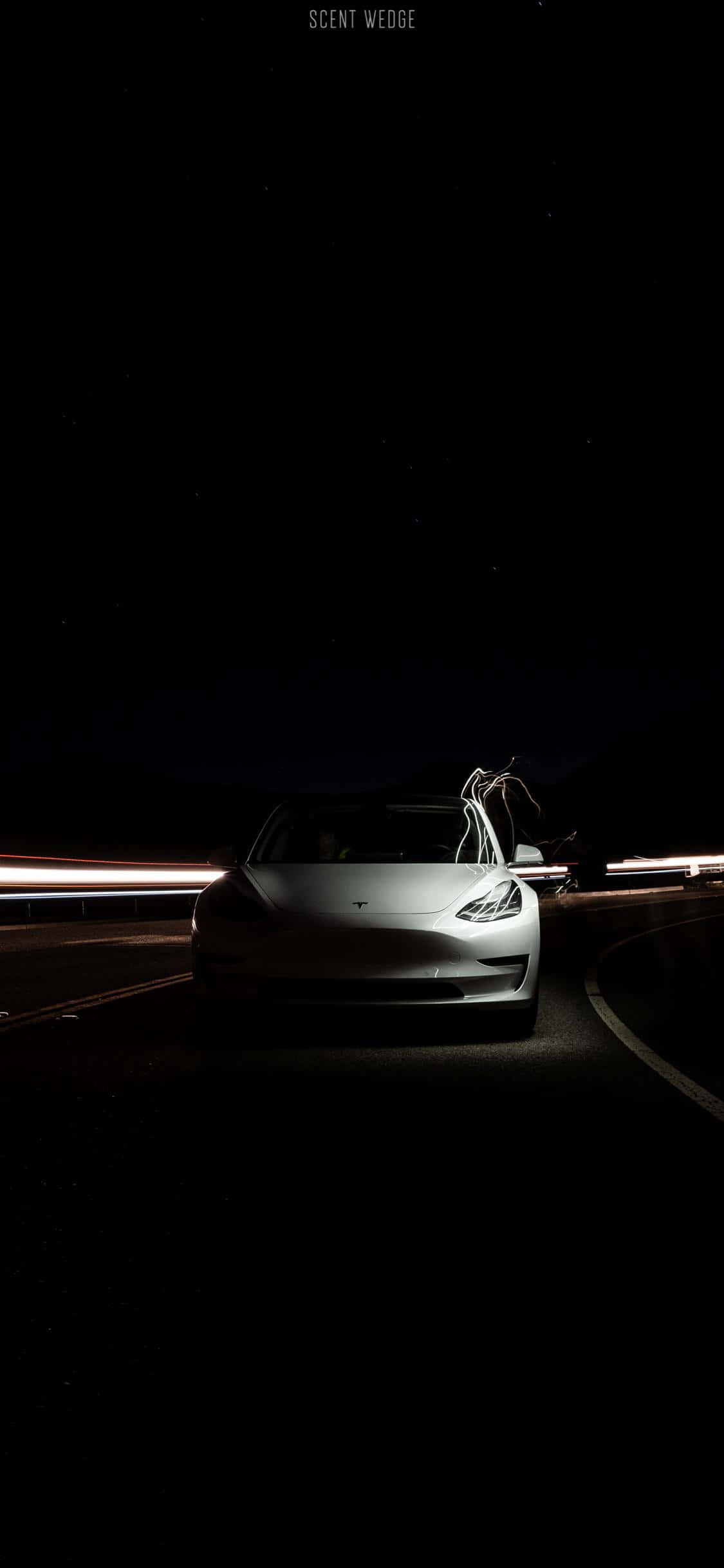 ปลดล็อกพลังของ #Tesla ของคุณด้วย iPhone วอลเปเปอร์