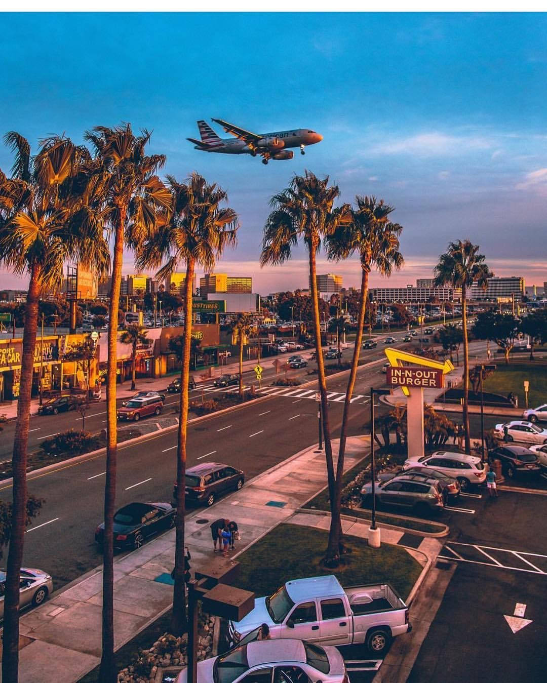 พระอาทิตย์ตกเหนือท่าอากาศยานนานาชาติลอสแอนเจลิส (LAX) วอลเปเปอร์