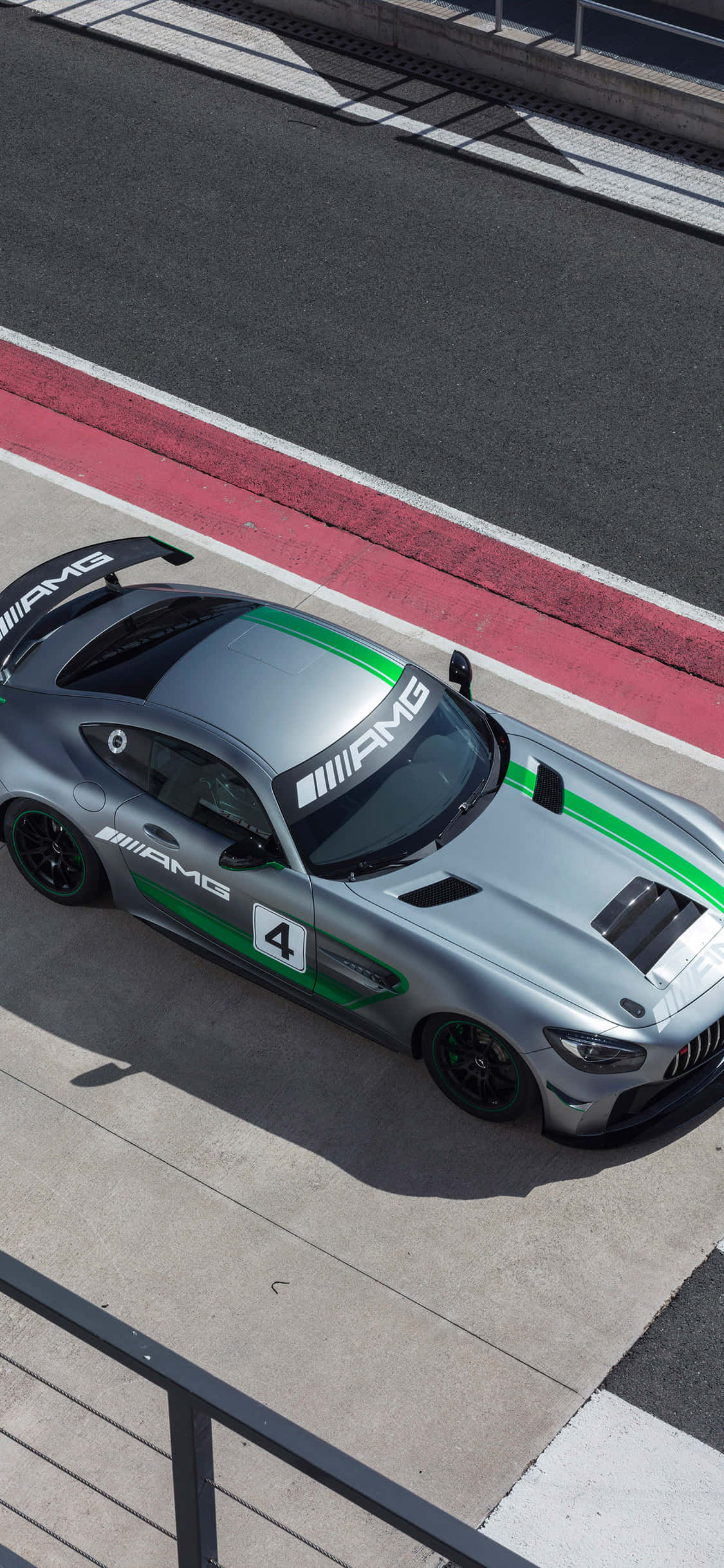 พื้นหลัง iPhone X AMG GT-R และ Mercedes-AMG GT4 วอลเปเปอร์