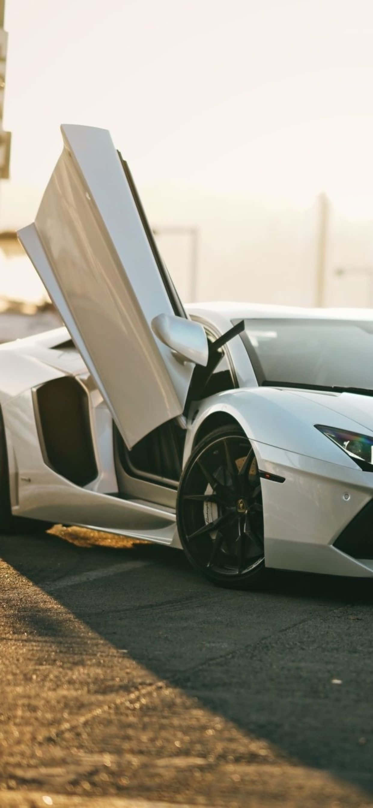 iPhone XS Max พื้นหลัง Lamborghini Aventador Roadster วอลเปเปอร์