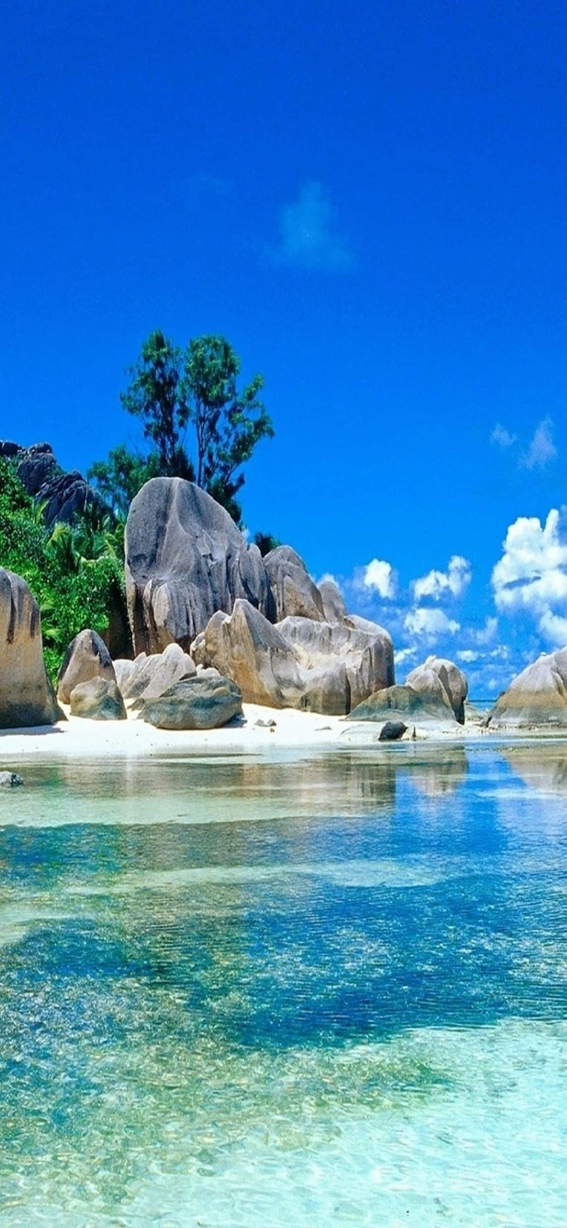 พื้นหลัง iPhone XS ชายหาด La Digue วอลเปเปอร์