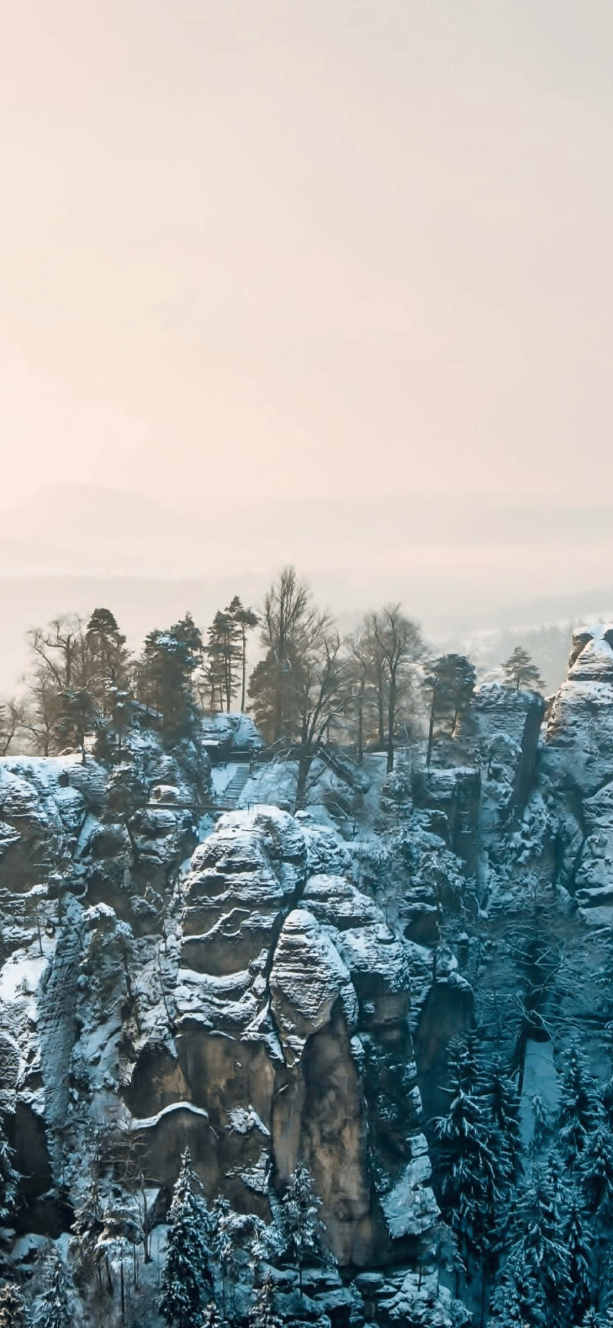 พื้นหลังฤดูหนาว Steep Mountain สำหรับ iPhone XS Max วอลเปเปอร์
